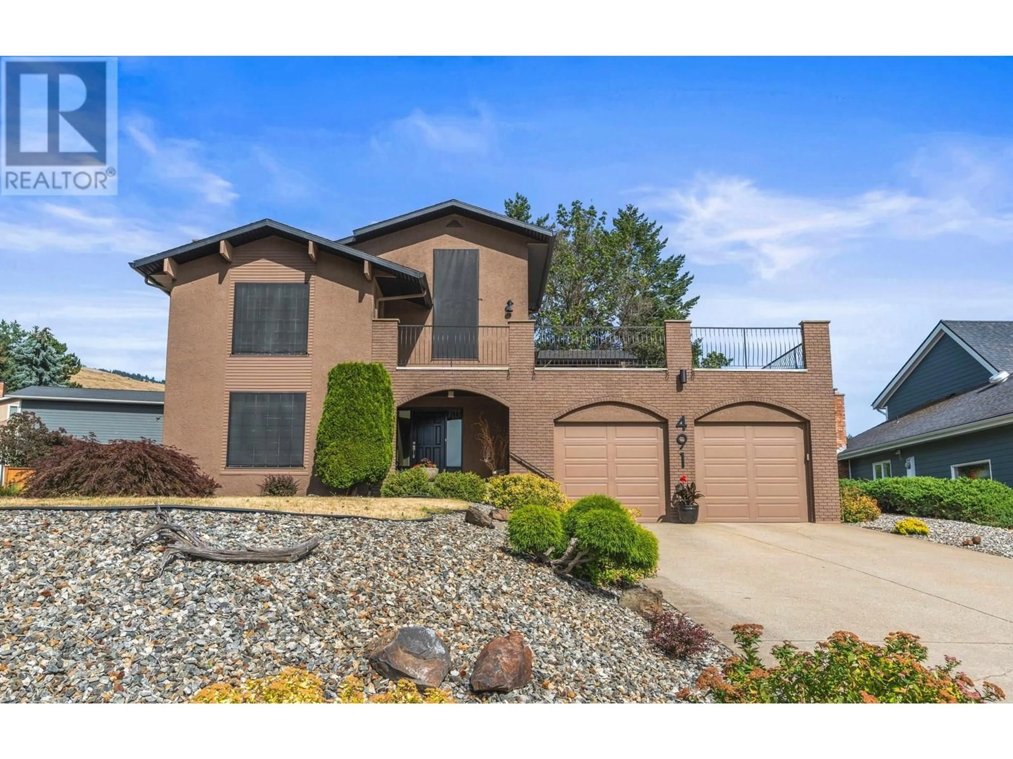 Home with brick exterior material, street for 491 TERRACE DRIVE, Coldstream British Columbia V1B2W9