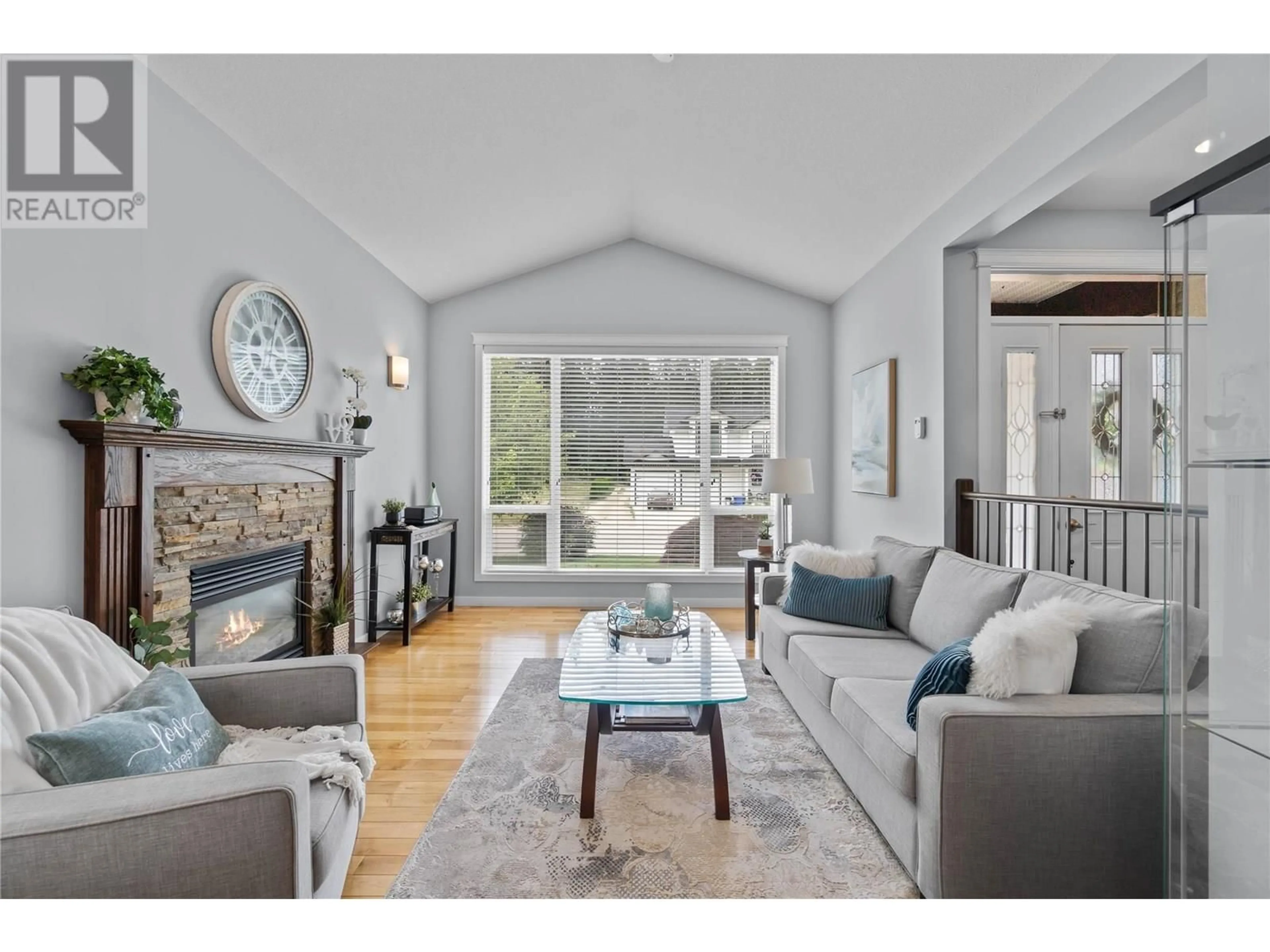 Living room with furniture, wood/laminate floor for 1830 22 STREET NORTHEAST, Salmon Arm British Columbia V1E4N3