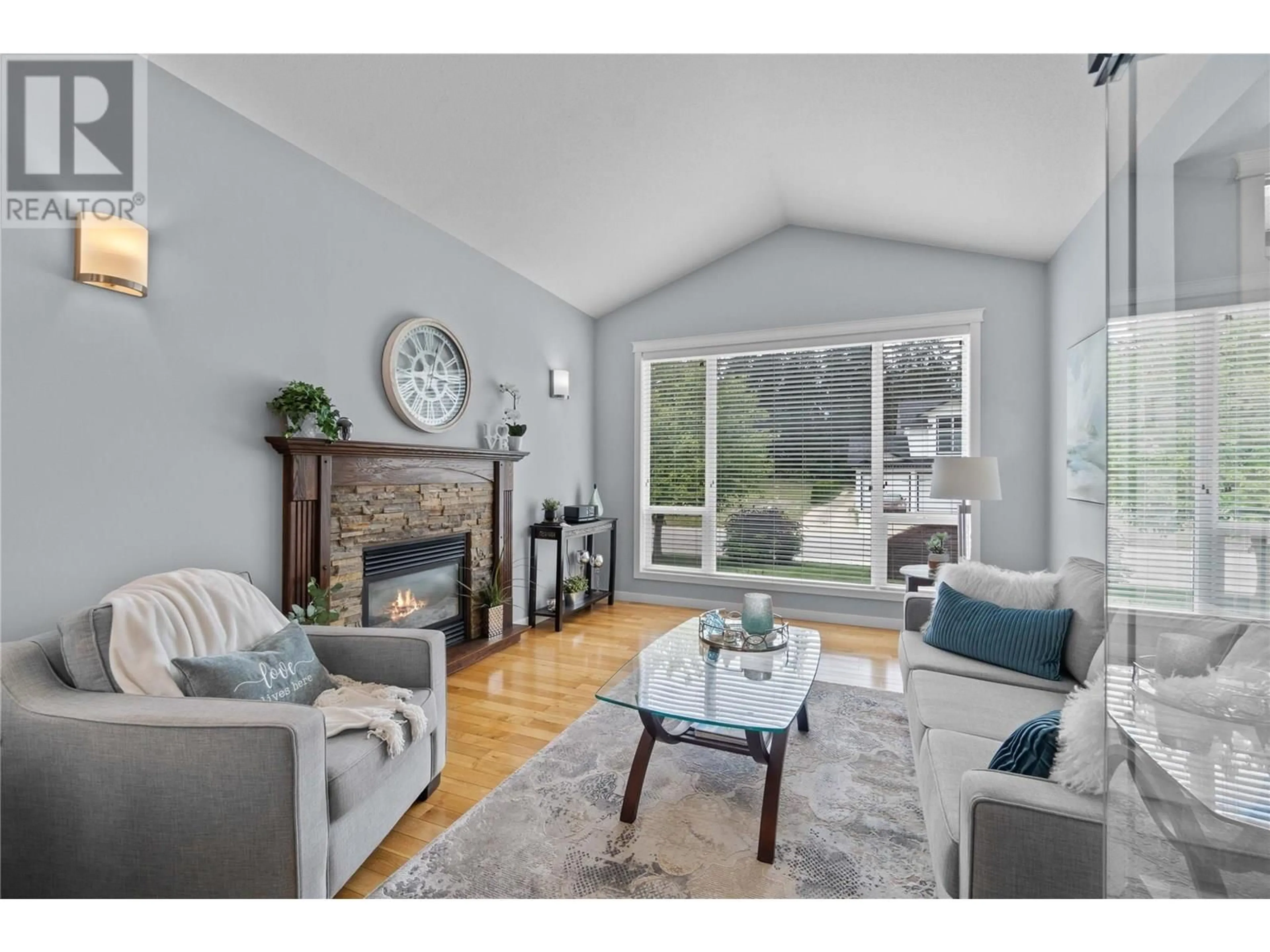 Living room with furniture, wood/laminate floor for 1830 22 STREET NORTHEAST, Salmon Arm British Columbia V1E4N3