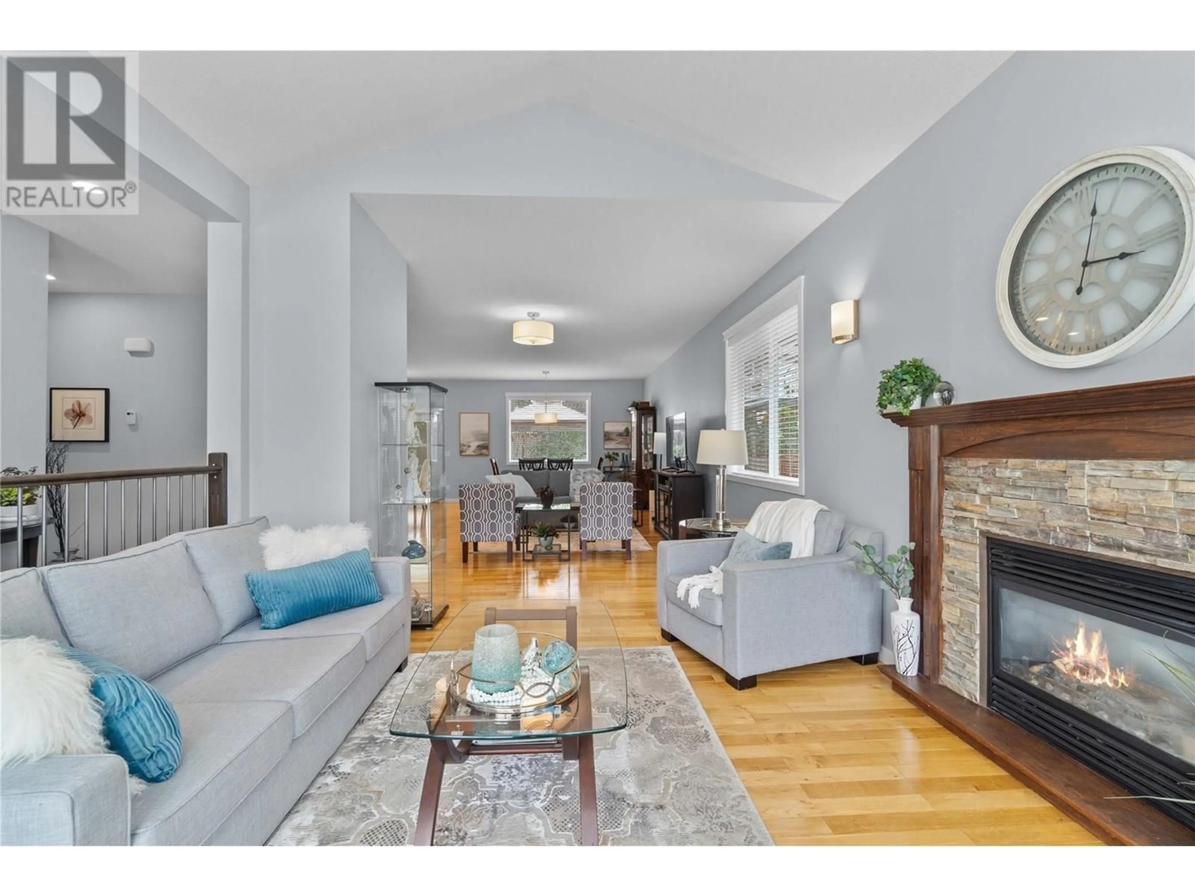 Living room with furniture, wood/laminate floor for 1830 22 STREET NORTHEAST, Salmon Arm British Columbia V1E4N3