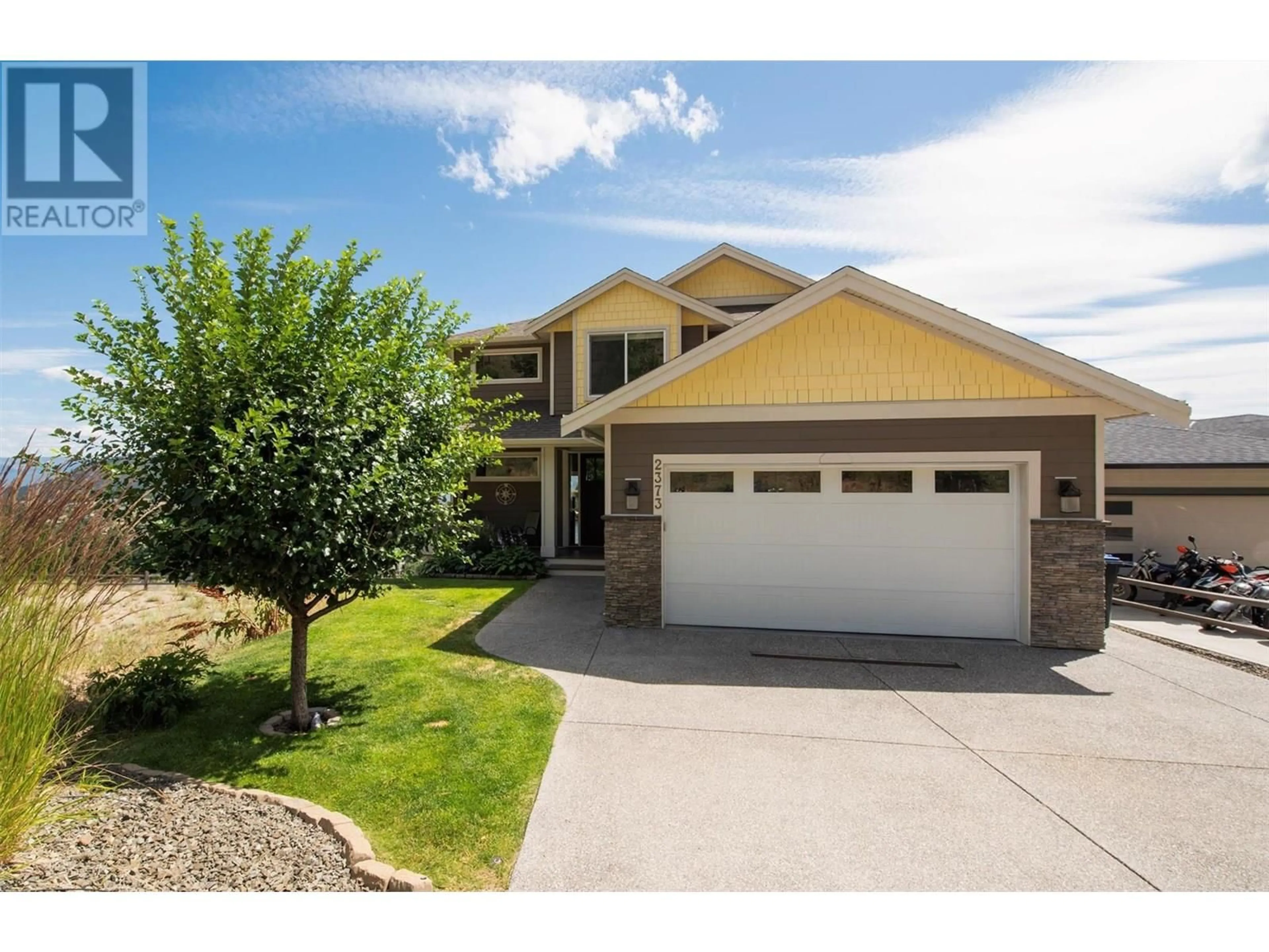 Home with vinyl exterior material, street for 2373 BIG SKY DRIVE, West Kelowna British Columbia V4T3M2