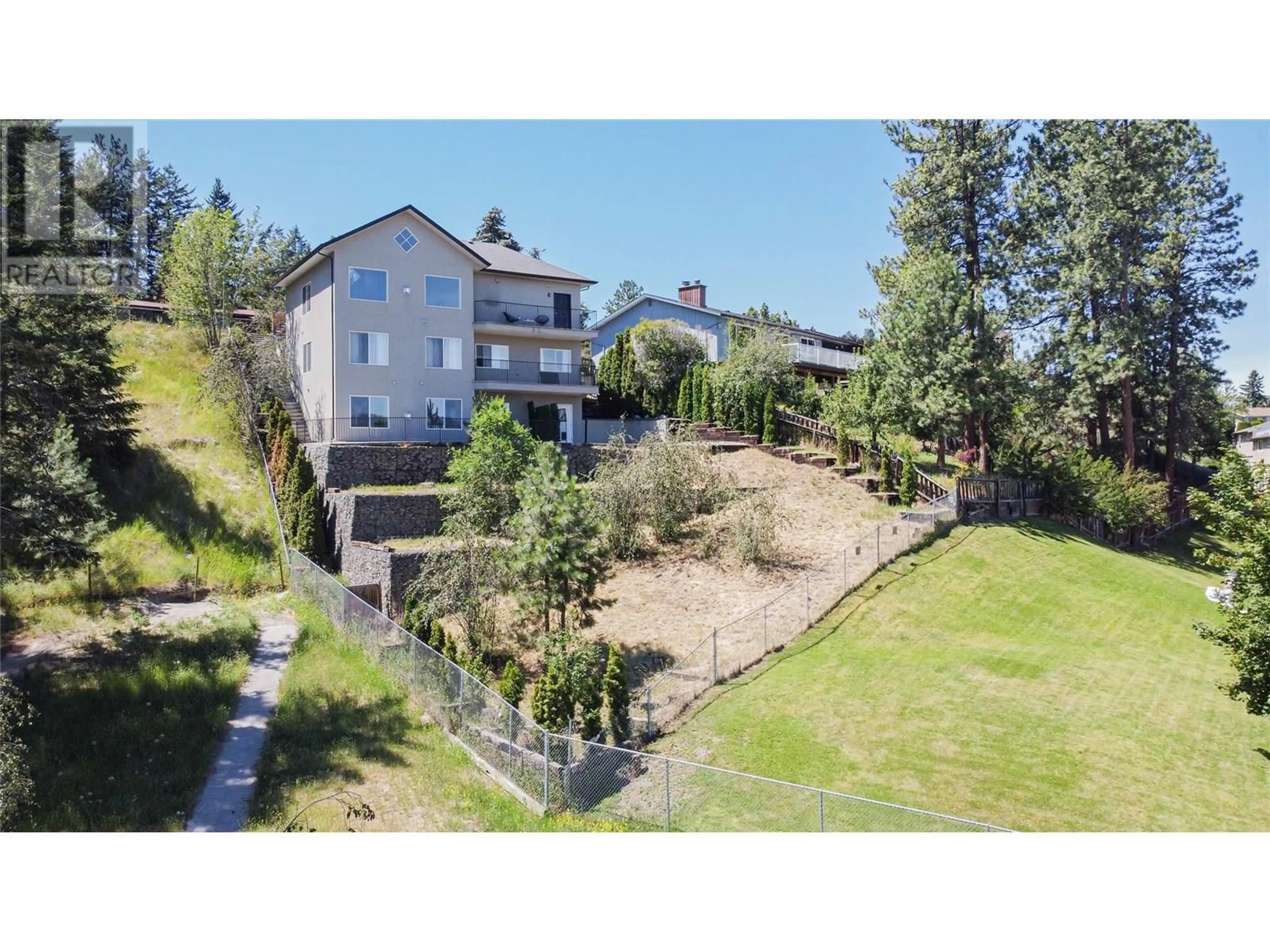 A pic from outside/outdoor area/front of a property/back of a property/a pic from drone, unknown for 216 MONMOUTH DRIVE, Kamloops British Columbia V2E1M1