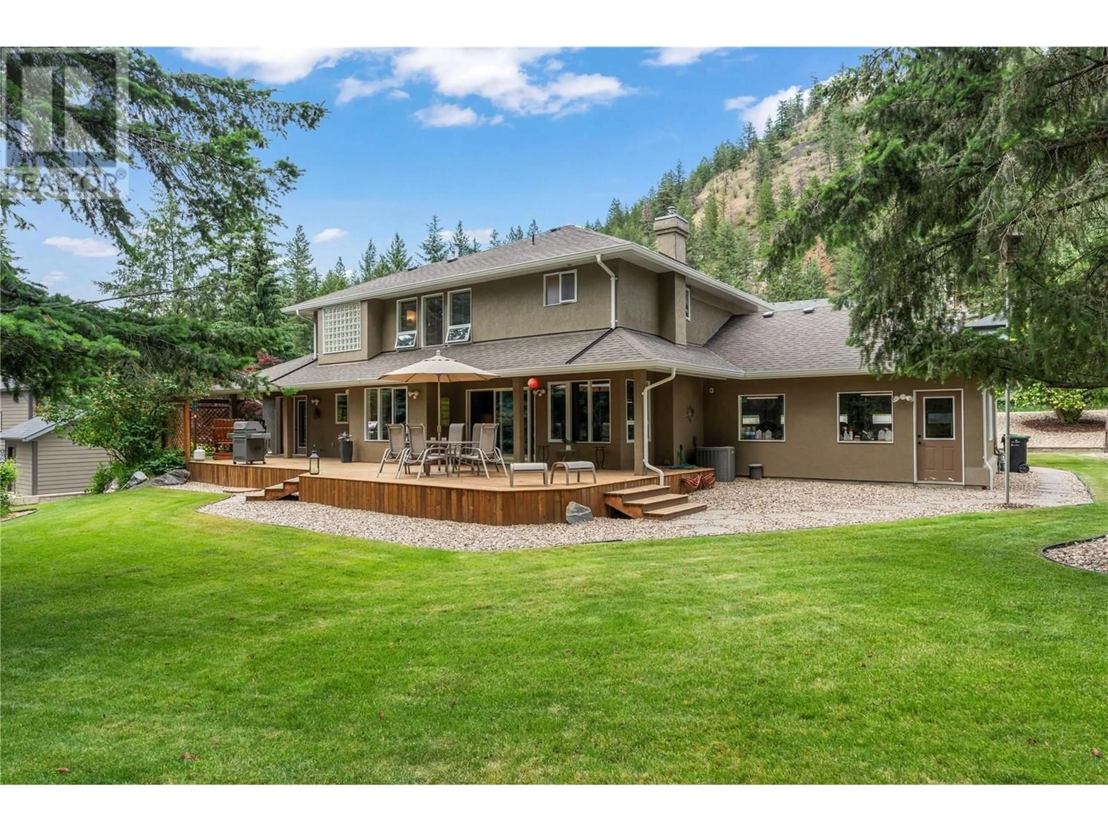 A pic from outside/outdoor area/front of a property/back of a property/a pic from drone, mountain view for 9270 TRONSON ROAD, Vernon British Columbia V1H1E3