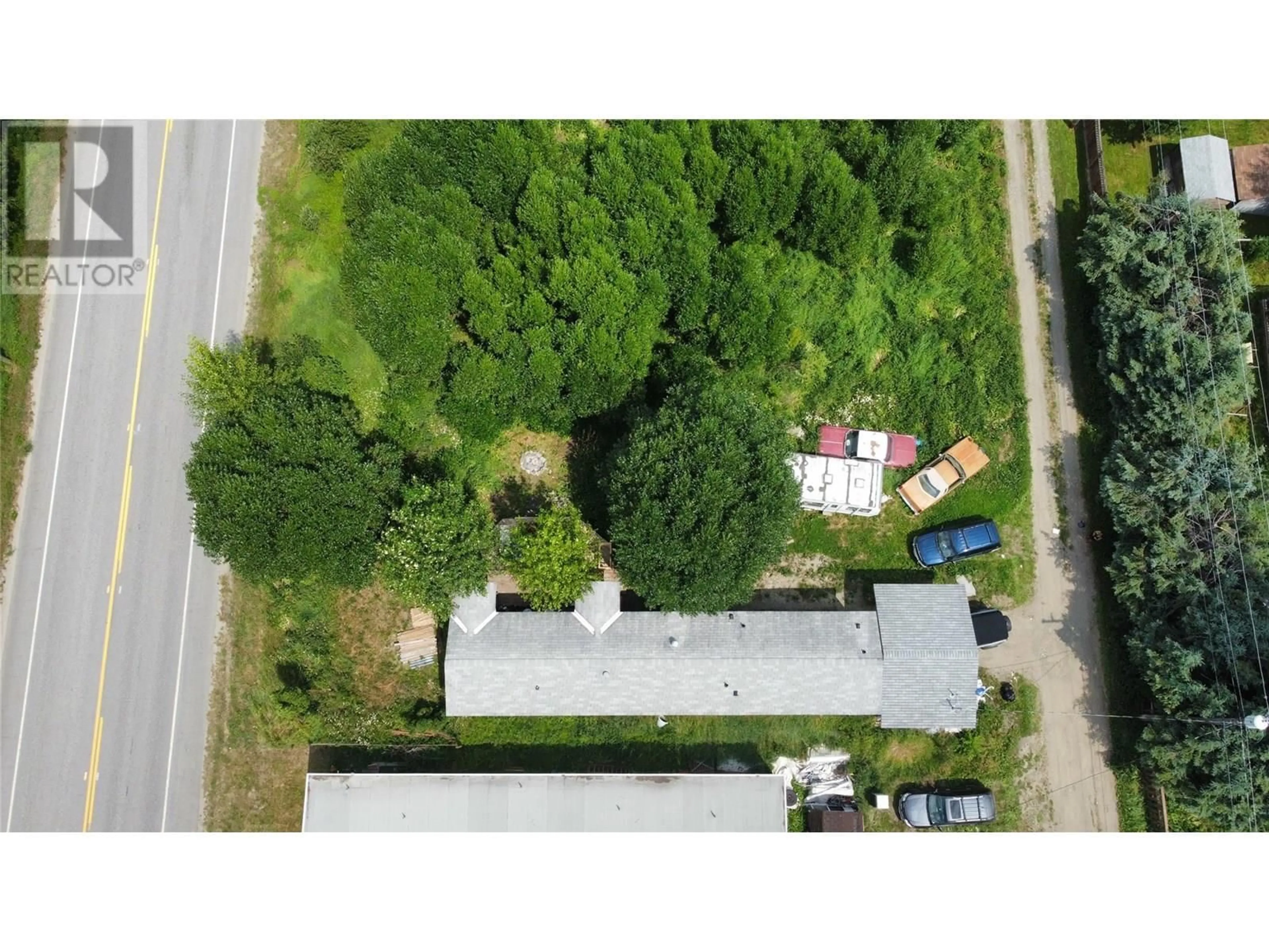 A pic from outside/outdoor area/front of a property/back of a property/a pic from drone, street for 115 RAILWAY AVENUE, Salmo British Columbia V0G1Z0