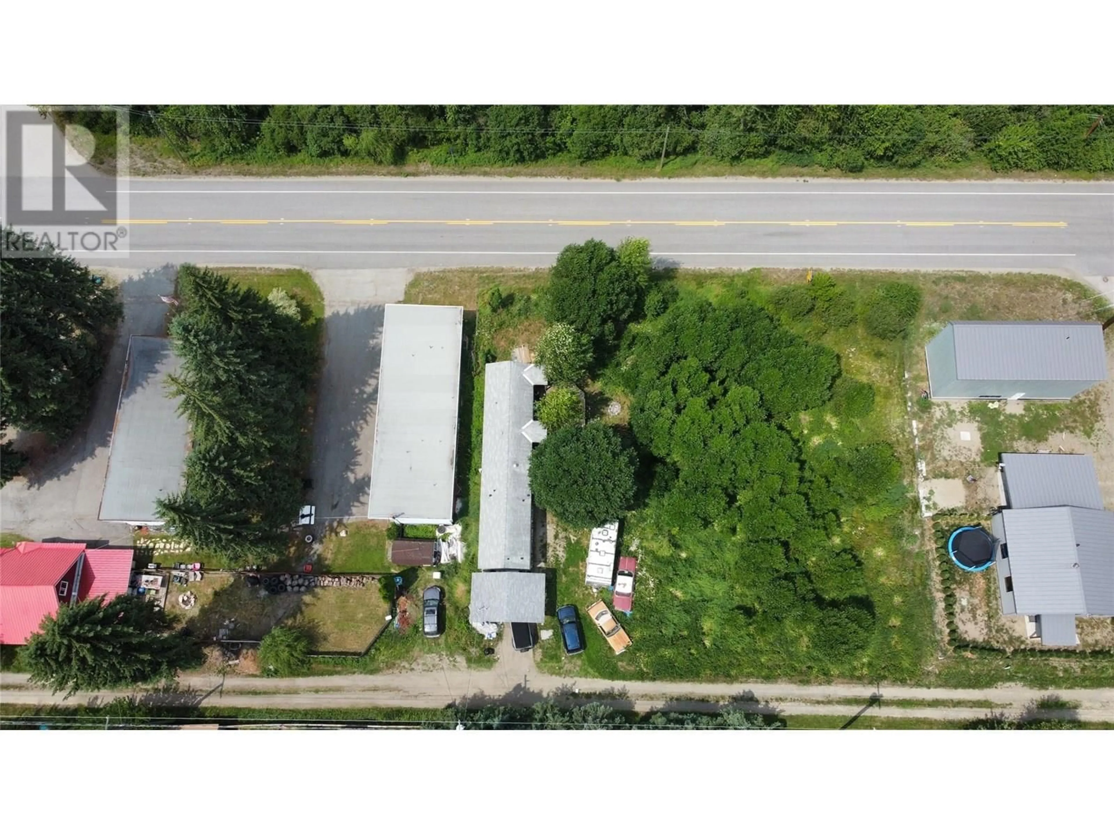 A pic from outside/outdoor area/front of a property/back of a property/a pic from drone, street for 115 RAILWAY AVENUE, Salmo British Columbia V0G1Z0