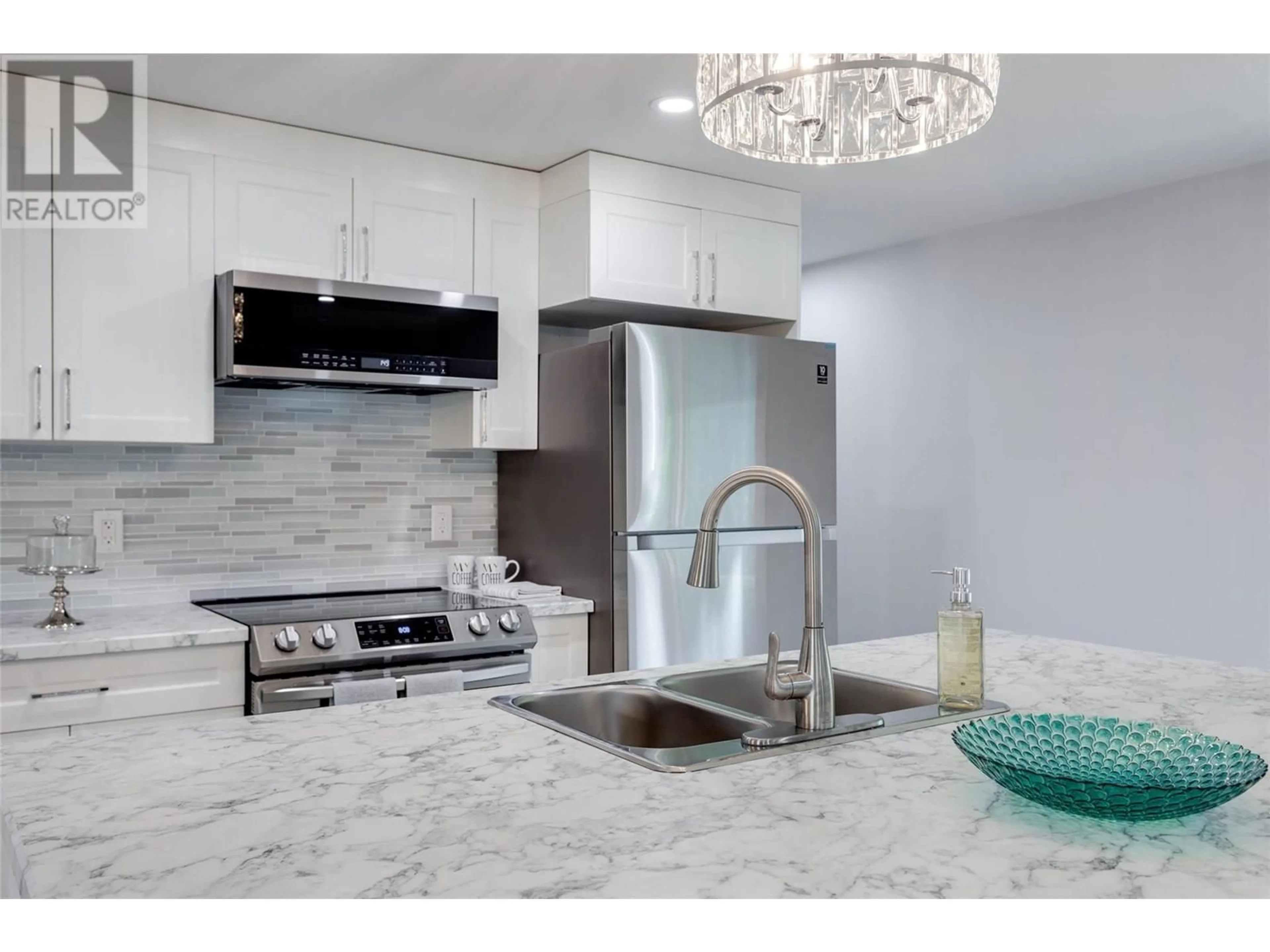 Contemporary kitchen, ceramic/tile floor for 10 - 3535 MCCULLOCH ROAD, Kelowna British Columbia V1W4R8