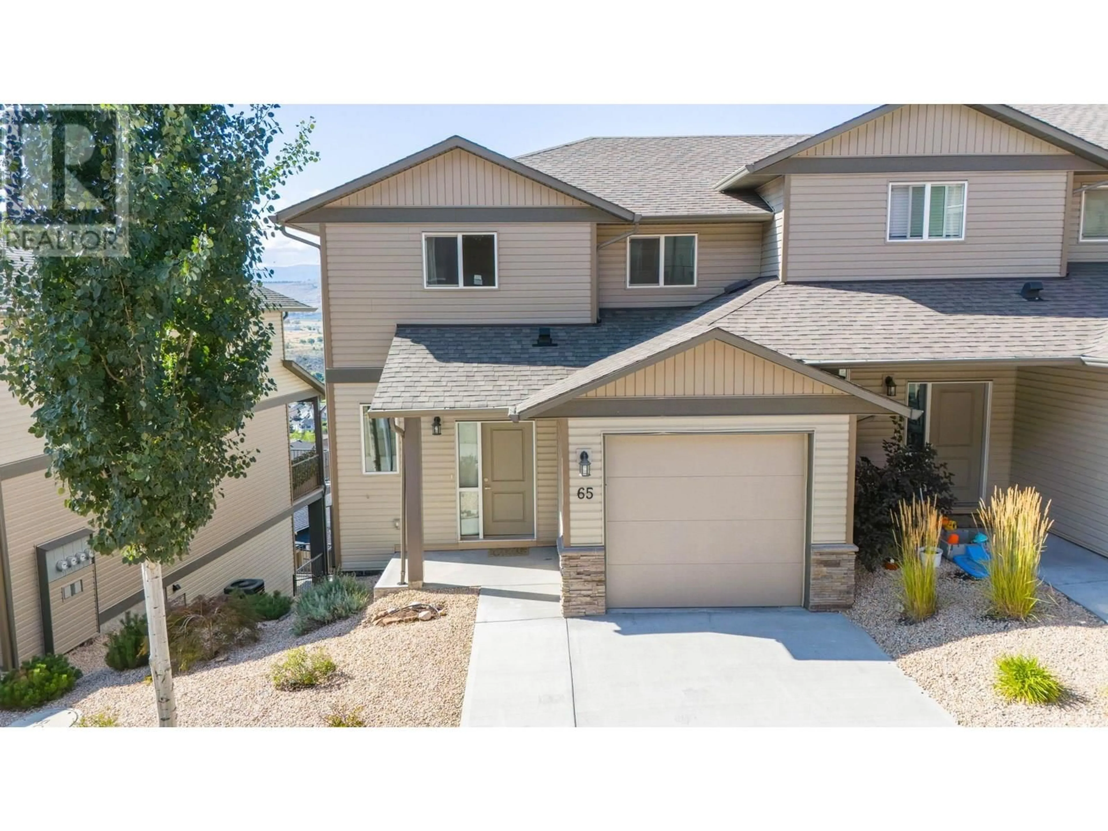 Home with vinyl exterior material, street for 65 - 933 MT. ROBSON PLACE, Vernon British Columbia V1B4G4