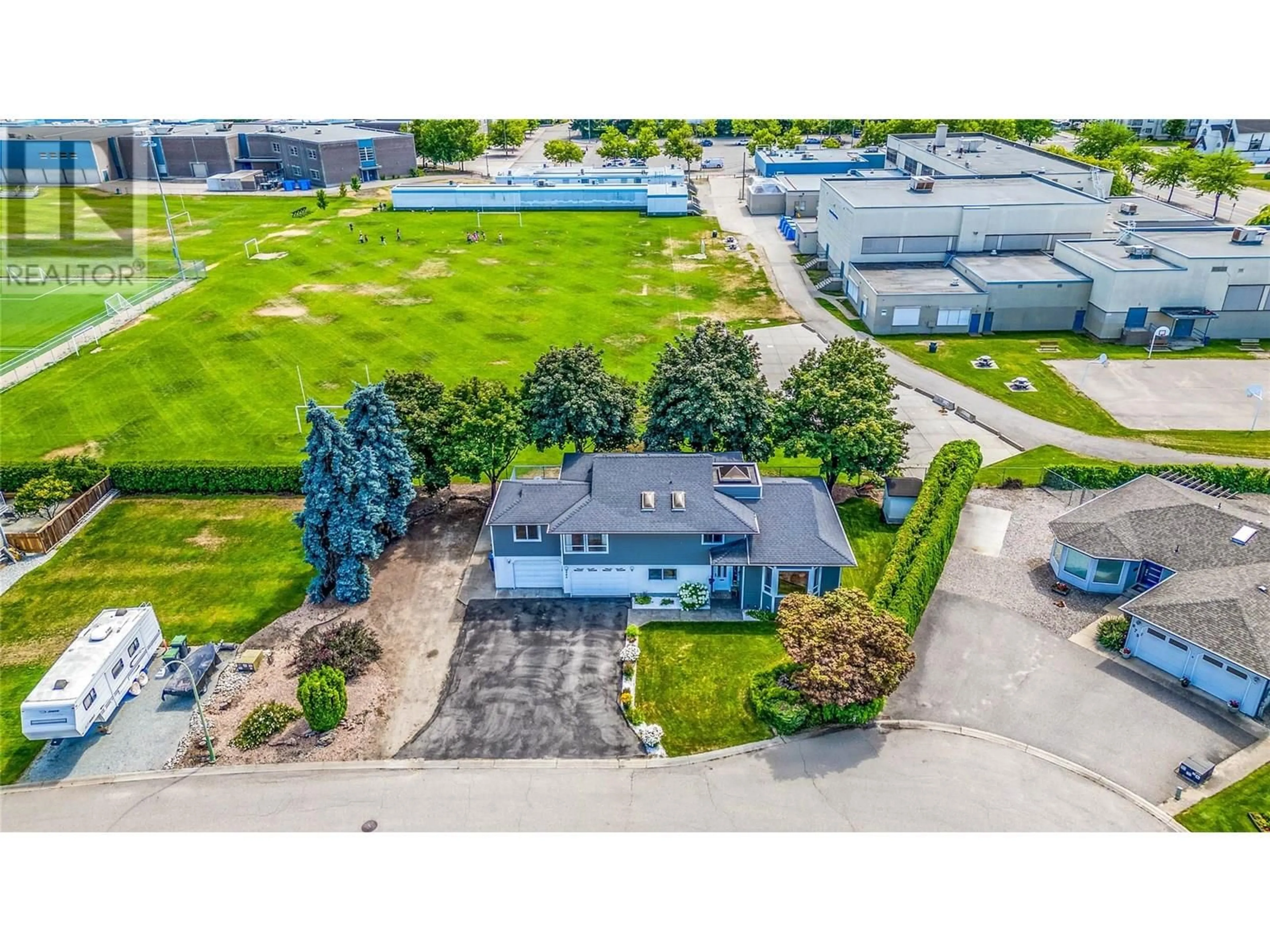 A pic from outside/outdoor area/front of a property/back of a property/a pic from drone, building for 685 RICHARDS ROAD, Kelowna British Columbia V1X2X5