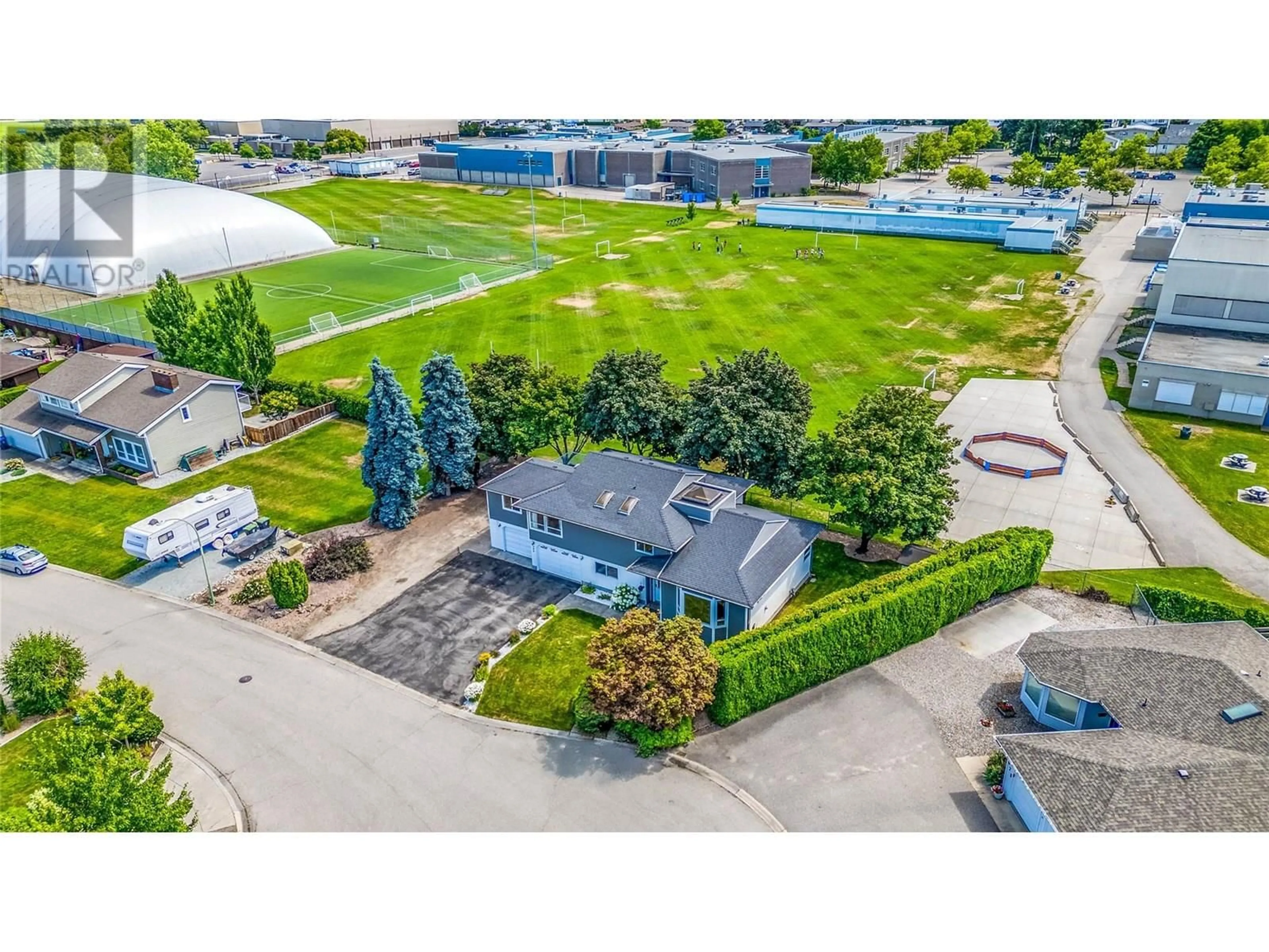 A pic from outside/outdoor area/front of a property/back of a property/a pic from drone, unknown for 685 RICHARDS ROAD, Kelowna British Columbia V1X2X5