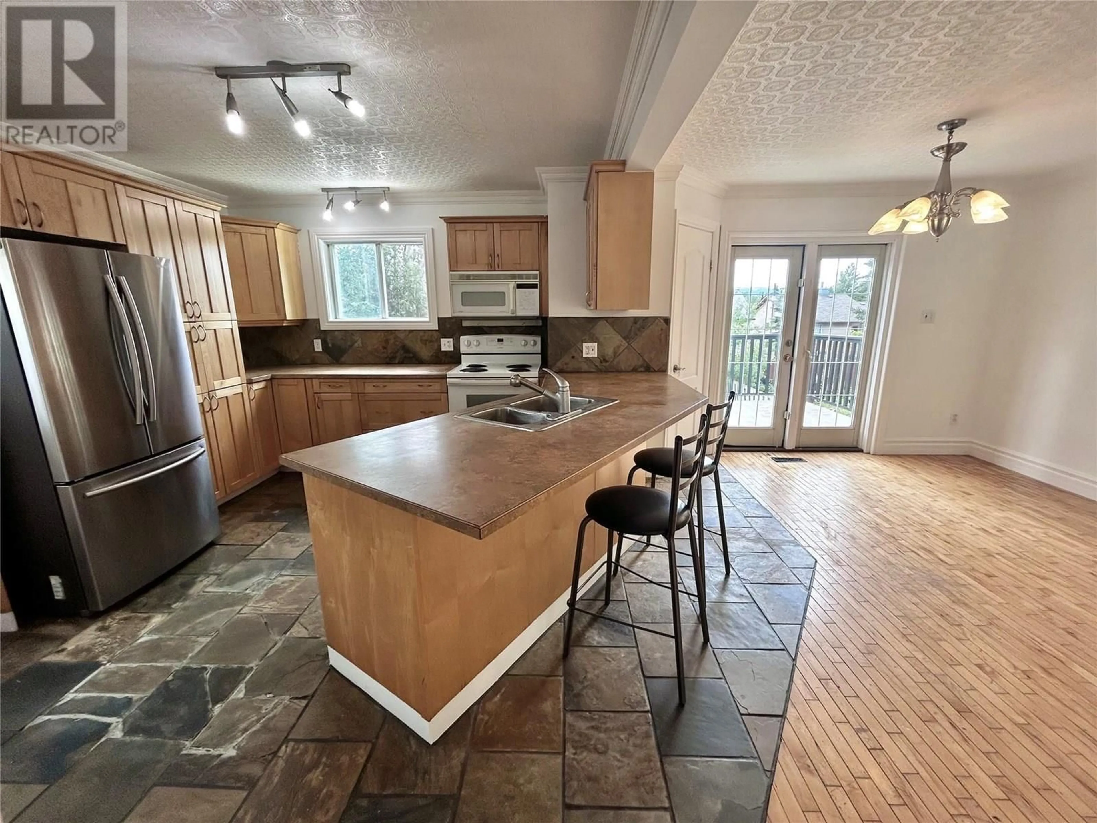 Open concept kitchen, ceramic/tile floor for 171 MURRAY DRIVE, Tumbler Ridge British Columbia V0C2W0