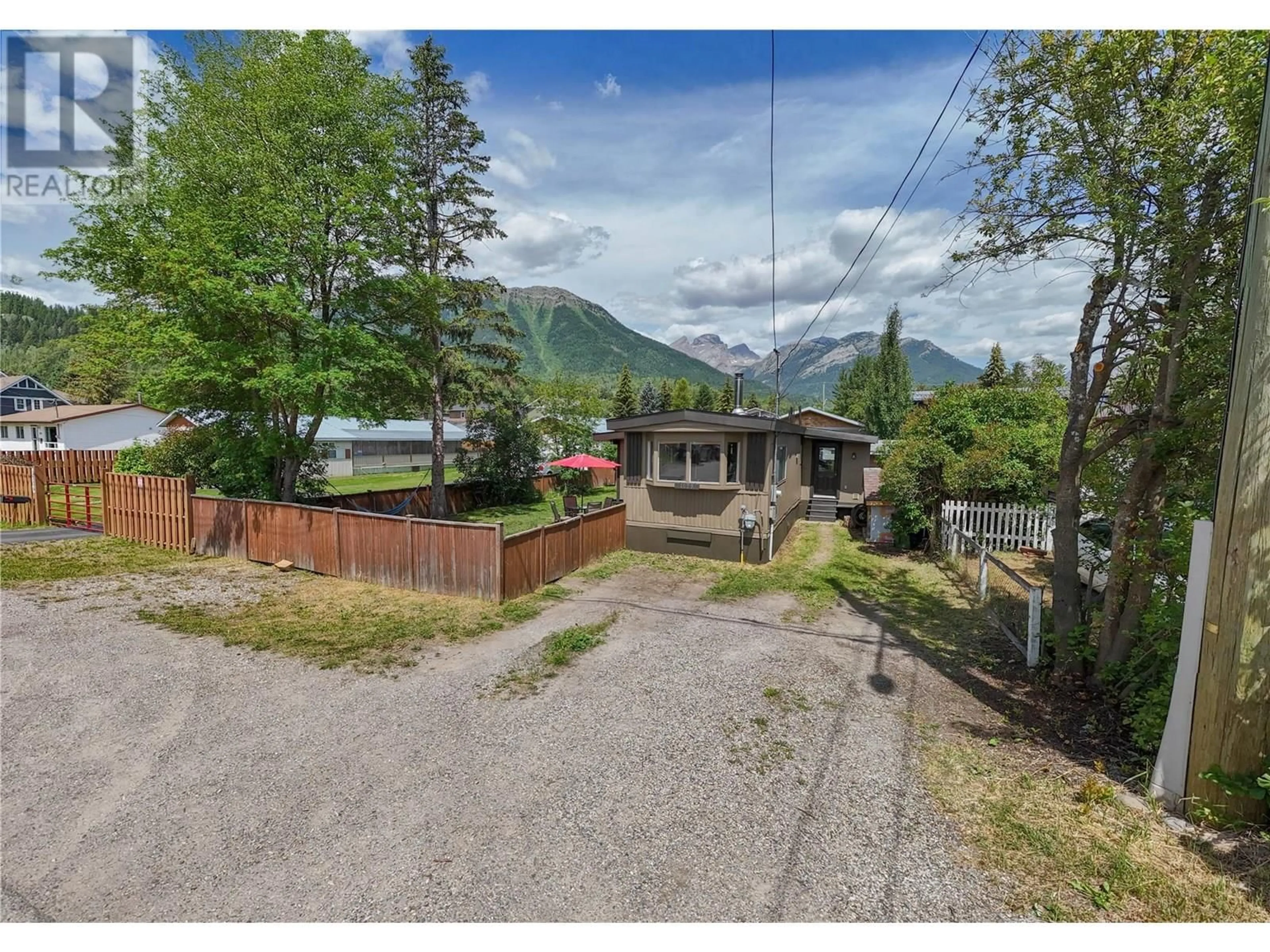 A pic from outside/outdoor area/front of a property/back of a property/a pic from drone, mountain view for 1099 MCDONALD AVENUE, Fernie British Columbia V0B1M1