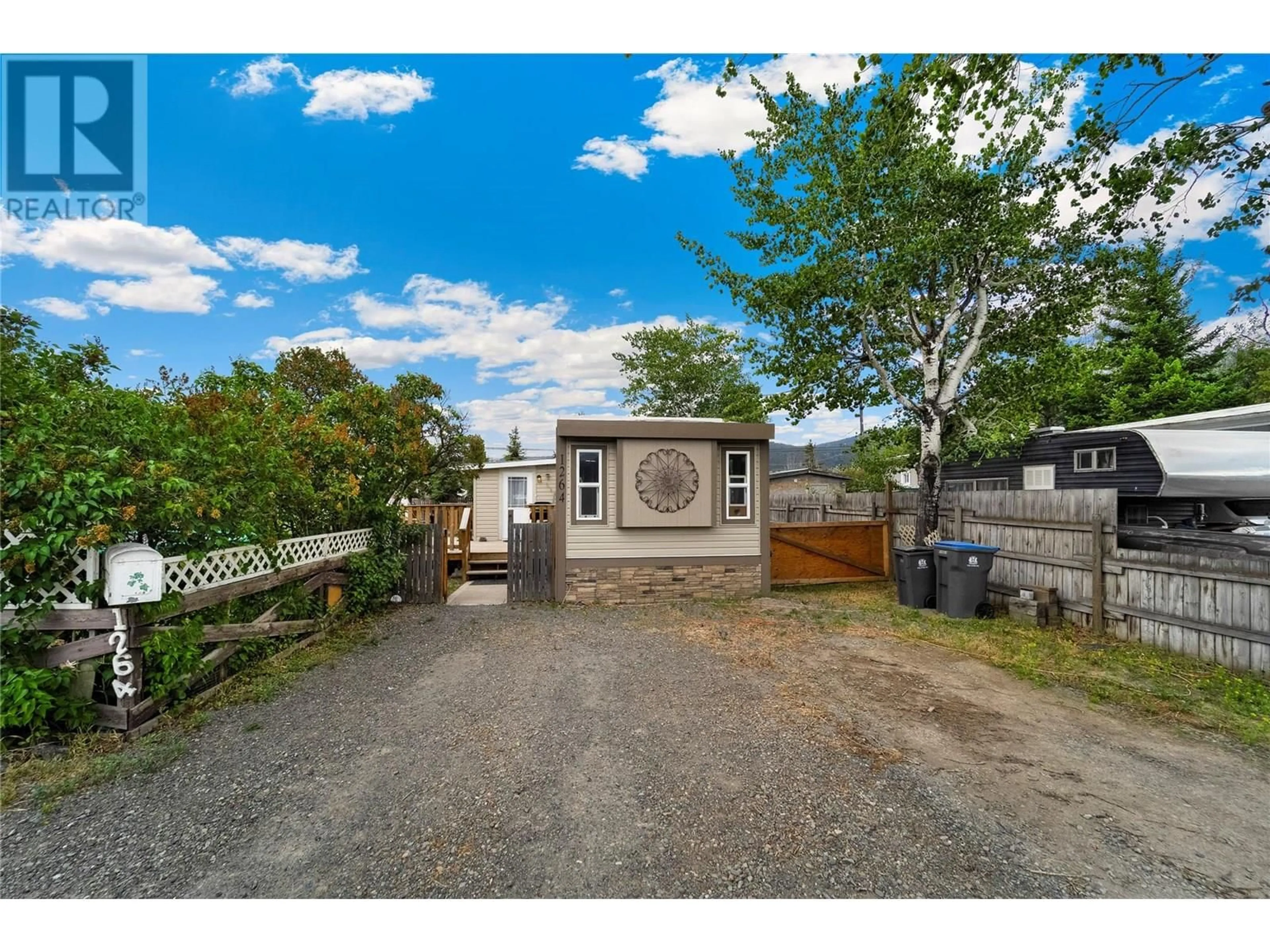 A pic from outside/outdoor area/front of a property/back of a property/a pic from drone, street for 1264 HOUSTON STREET, Merritt British Columbia V1K1E1