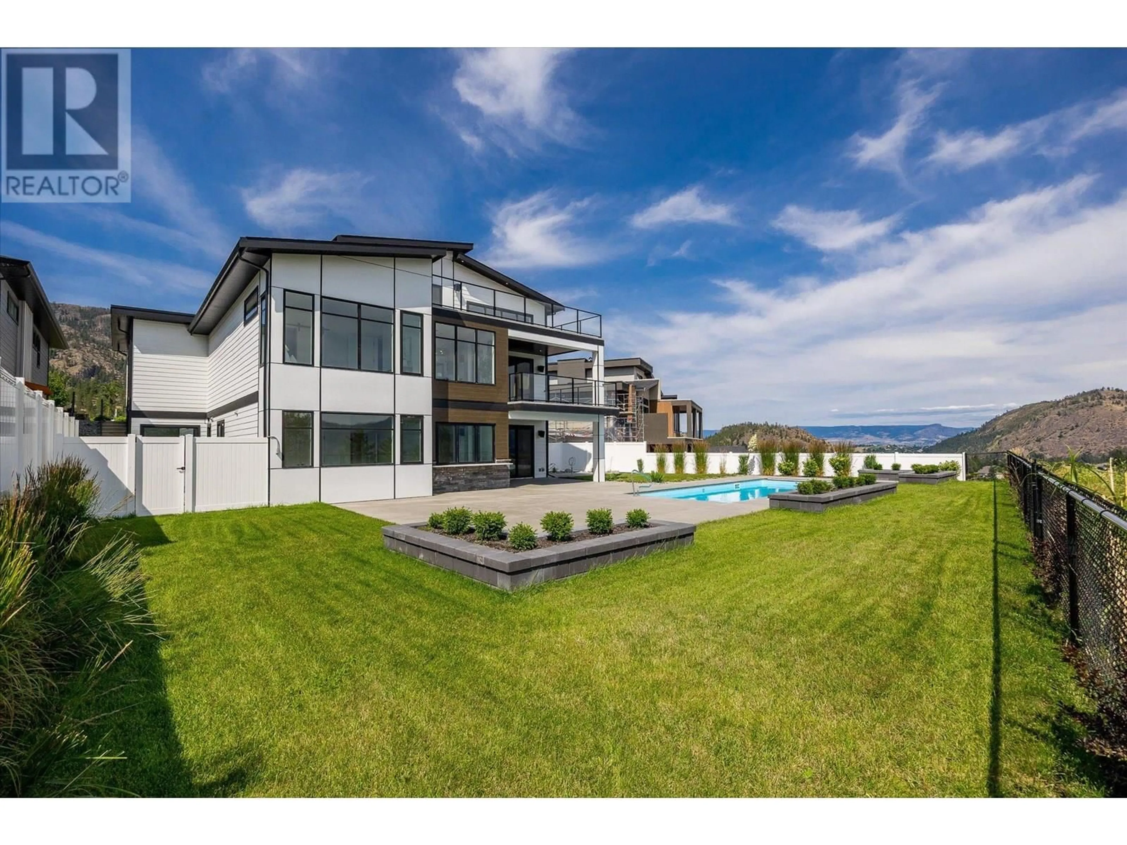 A pic from outside/outdoor area/front of a property/back of a property/a pic from drone, water/lake/river/ocean view for 2507 PINNACLE RIDGE DRIVE, West Kelowna British Columbia V4T0E3
