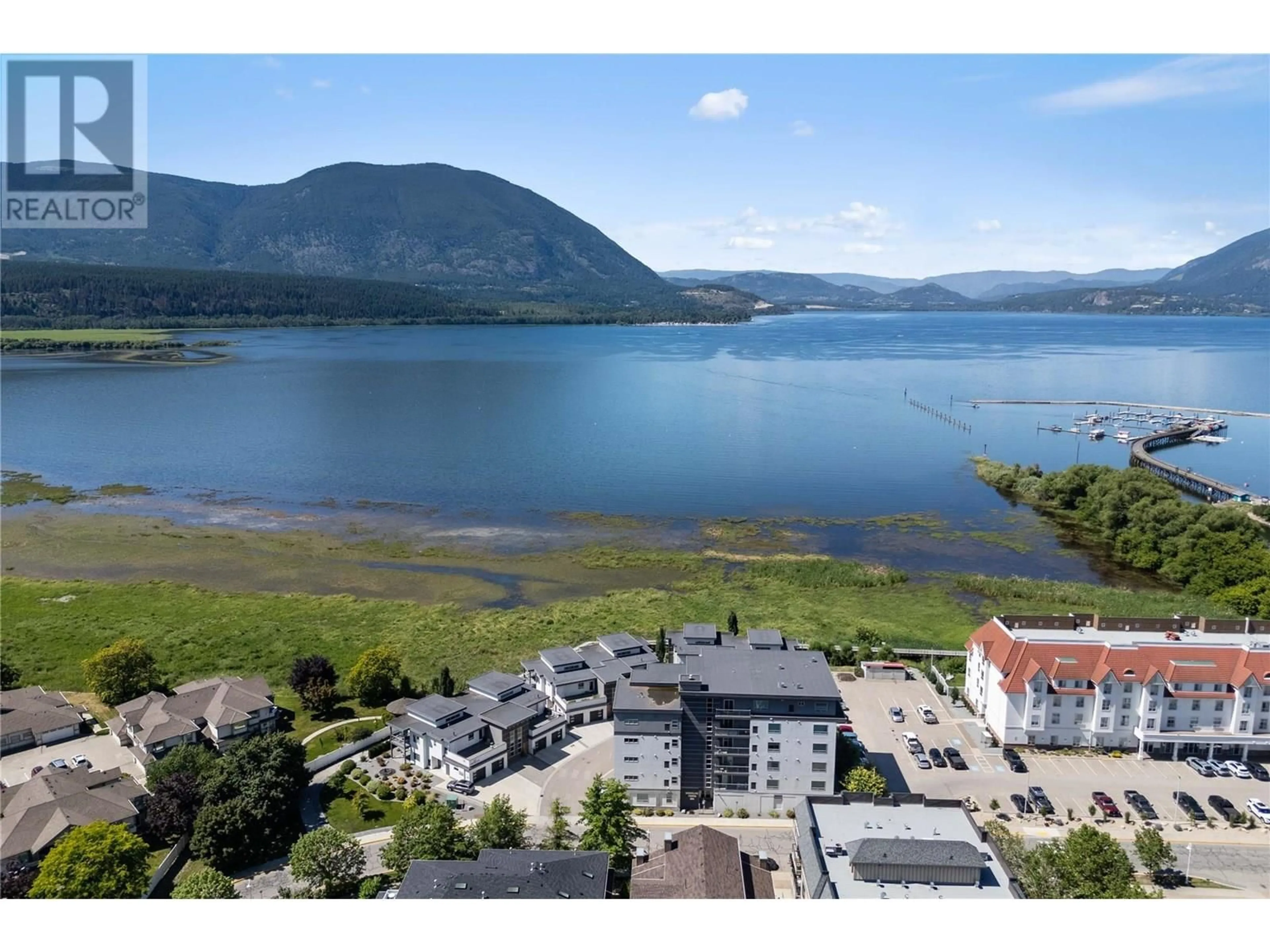 A pic from outside/outdoor area/front of a property/back of a property/a pic from drone, water/lake/river/ocean view for 10 - 121 HARBOURFRONT DRIVE NORTHEAST, Salmon Arm British Columbia V1E2T3