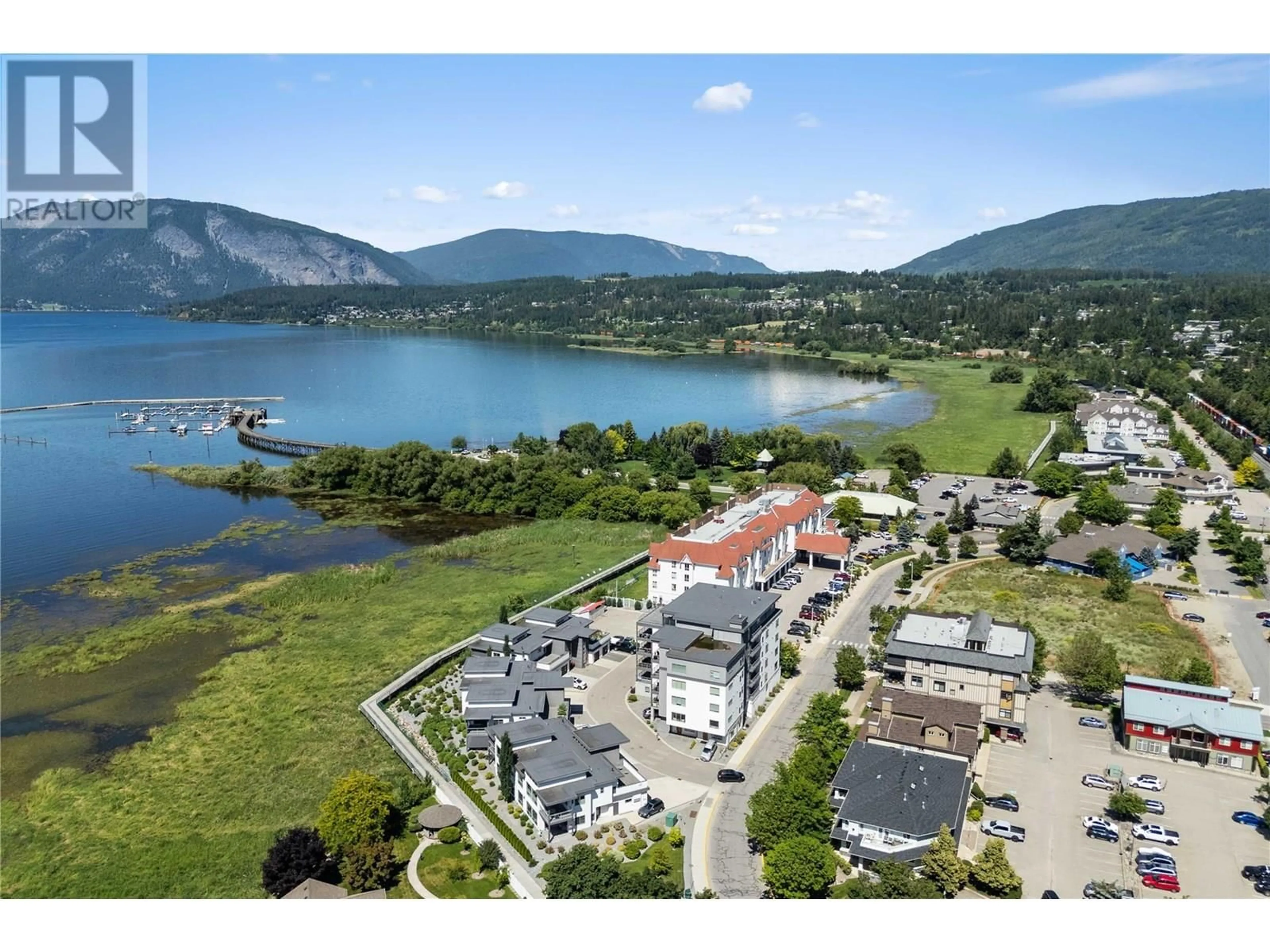 A pic from outside/outdoor area/front of a property/back of a property/a pic from drone, water/lake/river/ocean view for 10 - 121 HARBOURFRONT DRIVE NORTHEAST, Salmon Arm British Columbia V1E2T3