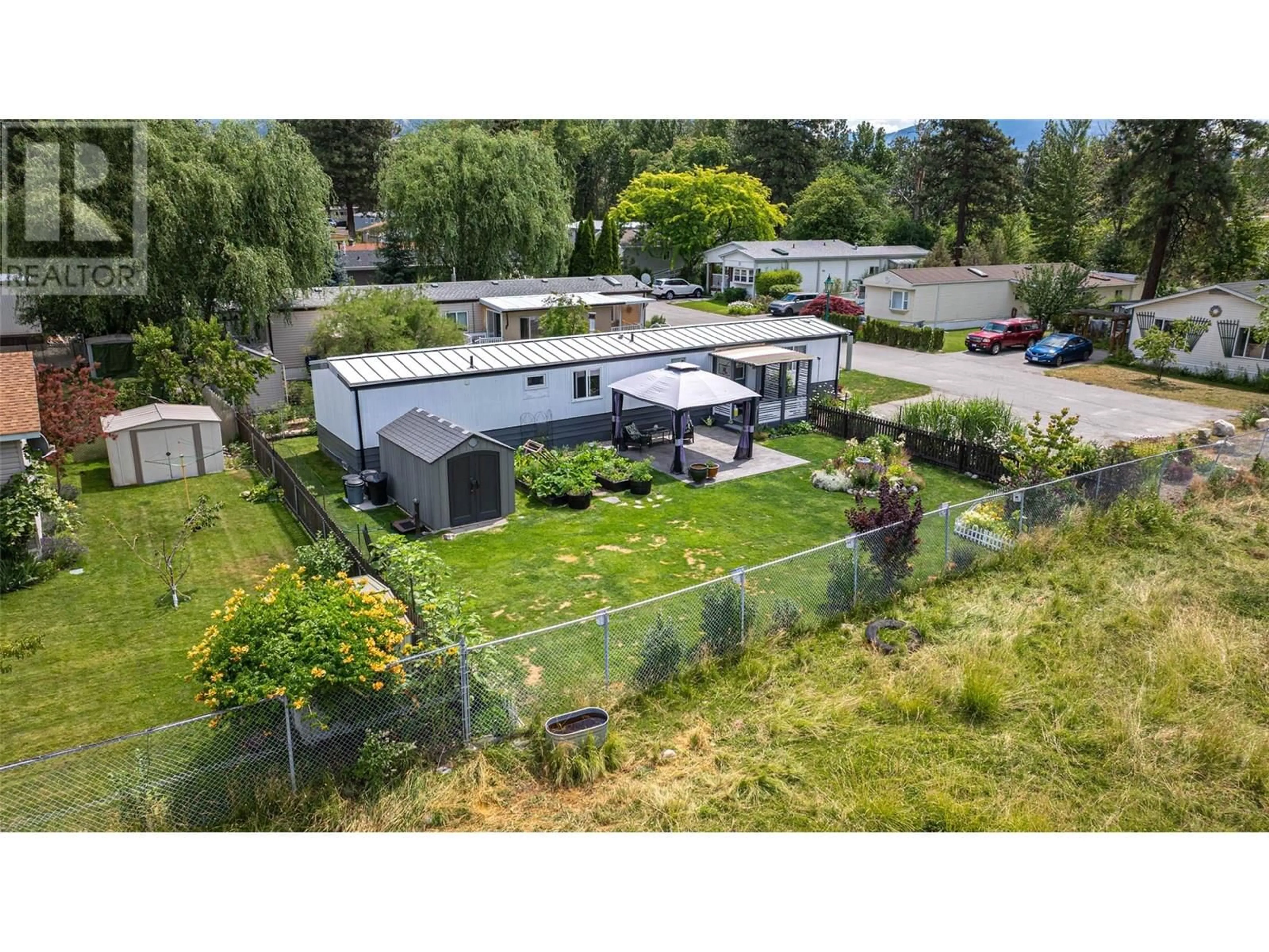 A pic from outside/outdoor area/front of a property/back of a property/a pic from drone, street for L2 - 4505 MCLEAN CREEK ROAD, Okanagan Falls British Columbia V0H1R1