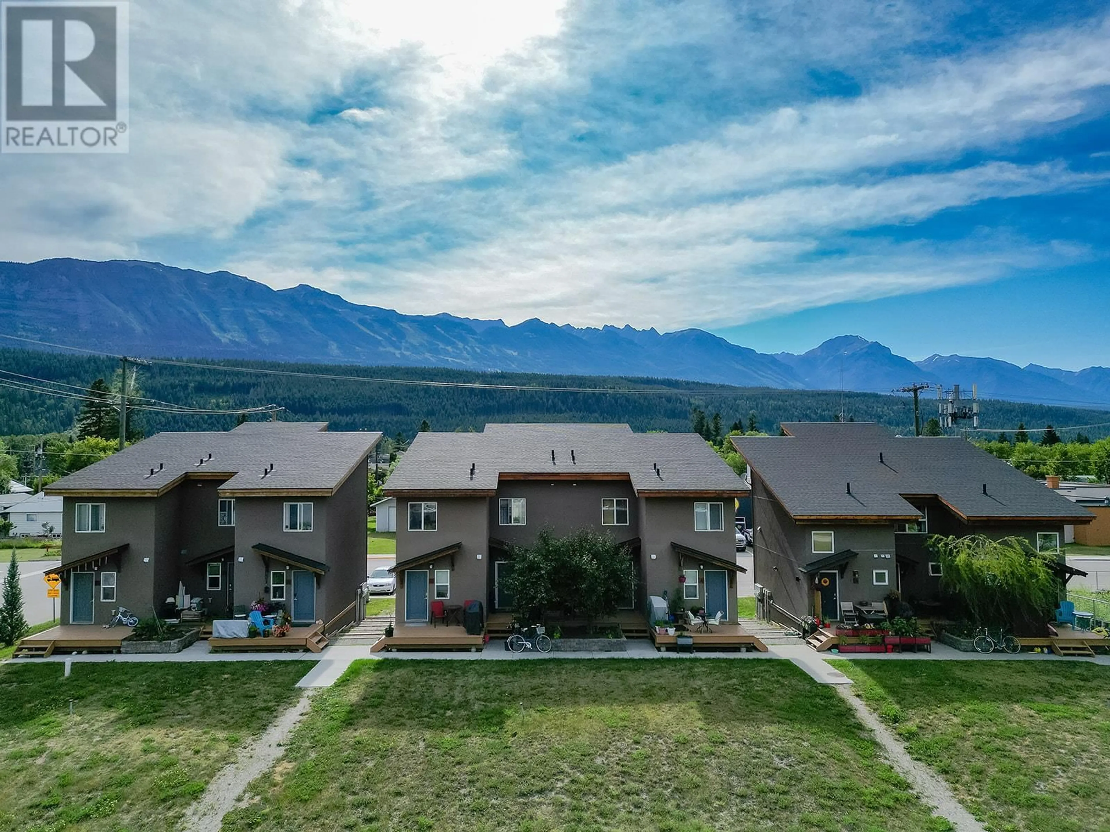A pic from outside/outdoor area/front of a property/back of a property/a pic from drone, mountain view for 7 - 1110 11TH  S AVENUE, Golden British Columbia V0A1H0