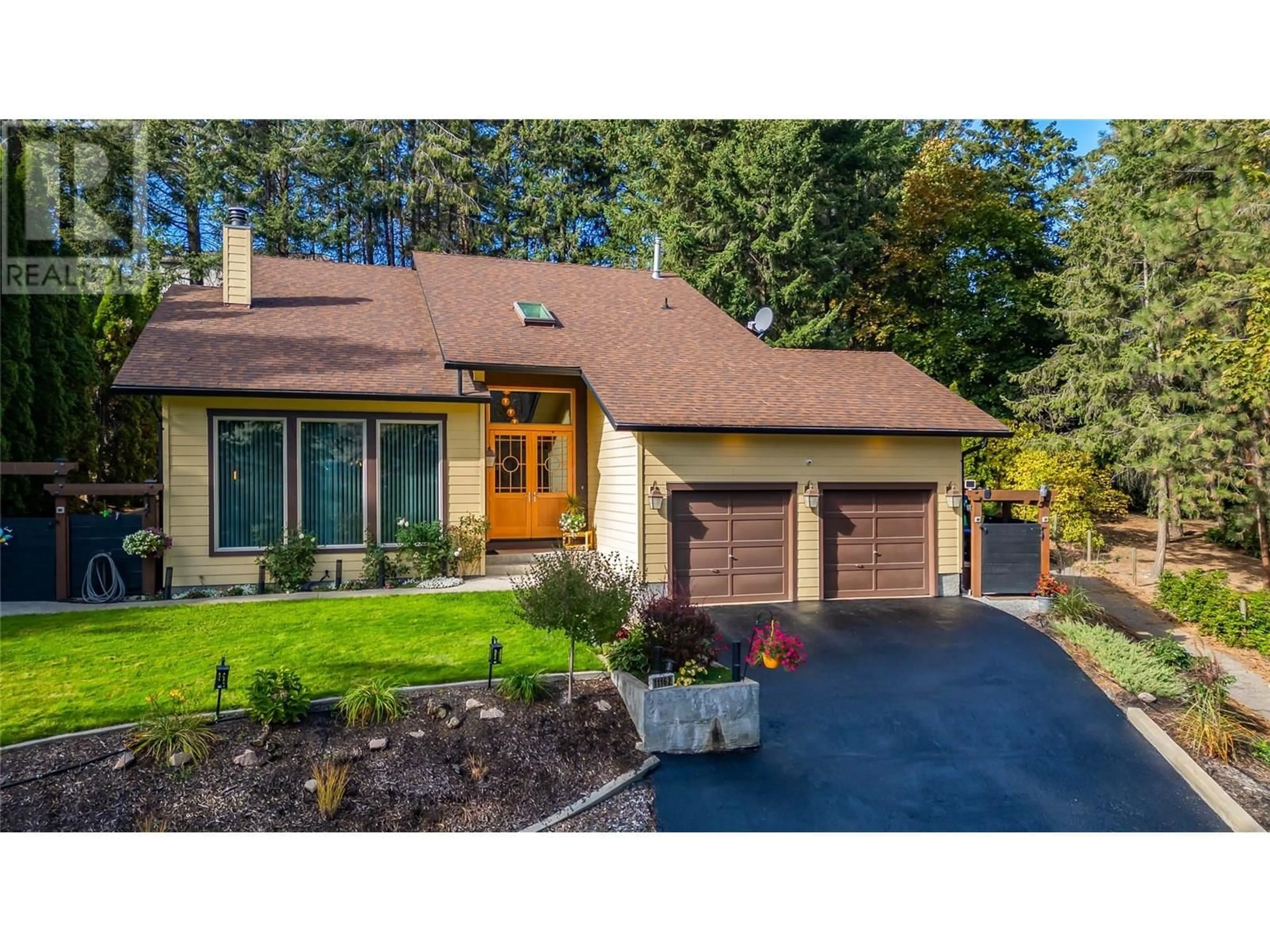 Home with brick exterior material, street for 11162 EVA ROAD, Lake Country British Columbia V4V1H4