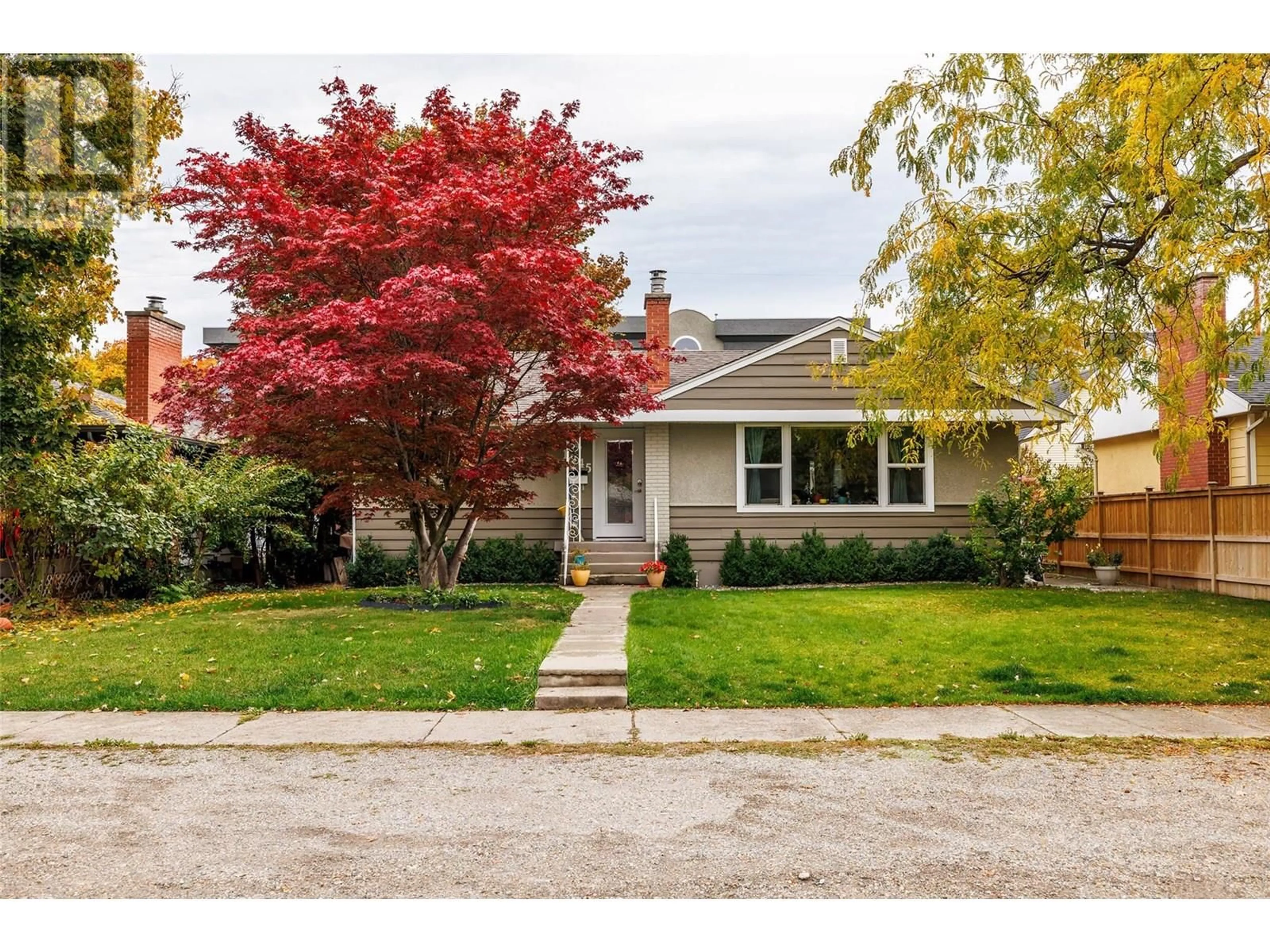 Home with brick exterior material, street for 1945 BOWES STREET, Kelowna British Columbia V1Y3C2