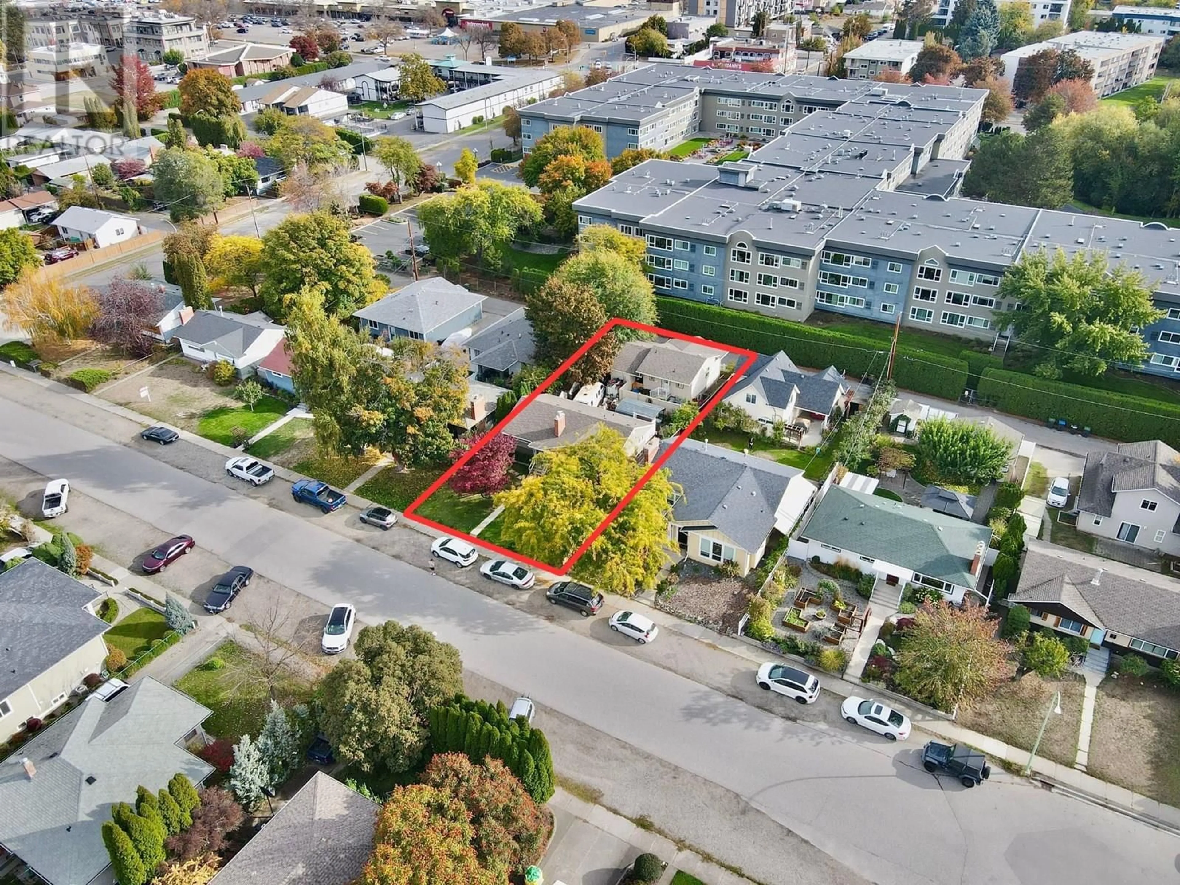 A pic from outside/outdoor area/front of a property/back of a property/a pic from drone, street for 1945 BOWES STREET, Kelowna British Columbia V1Y3C2