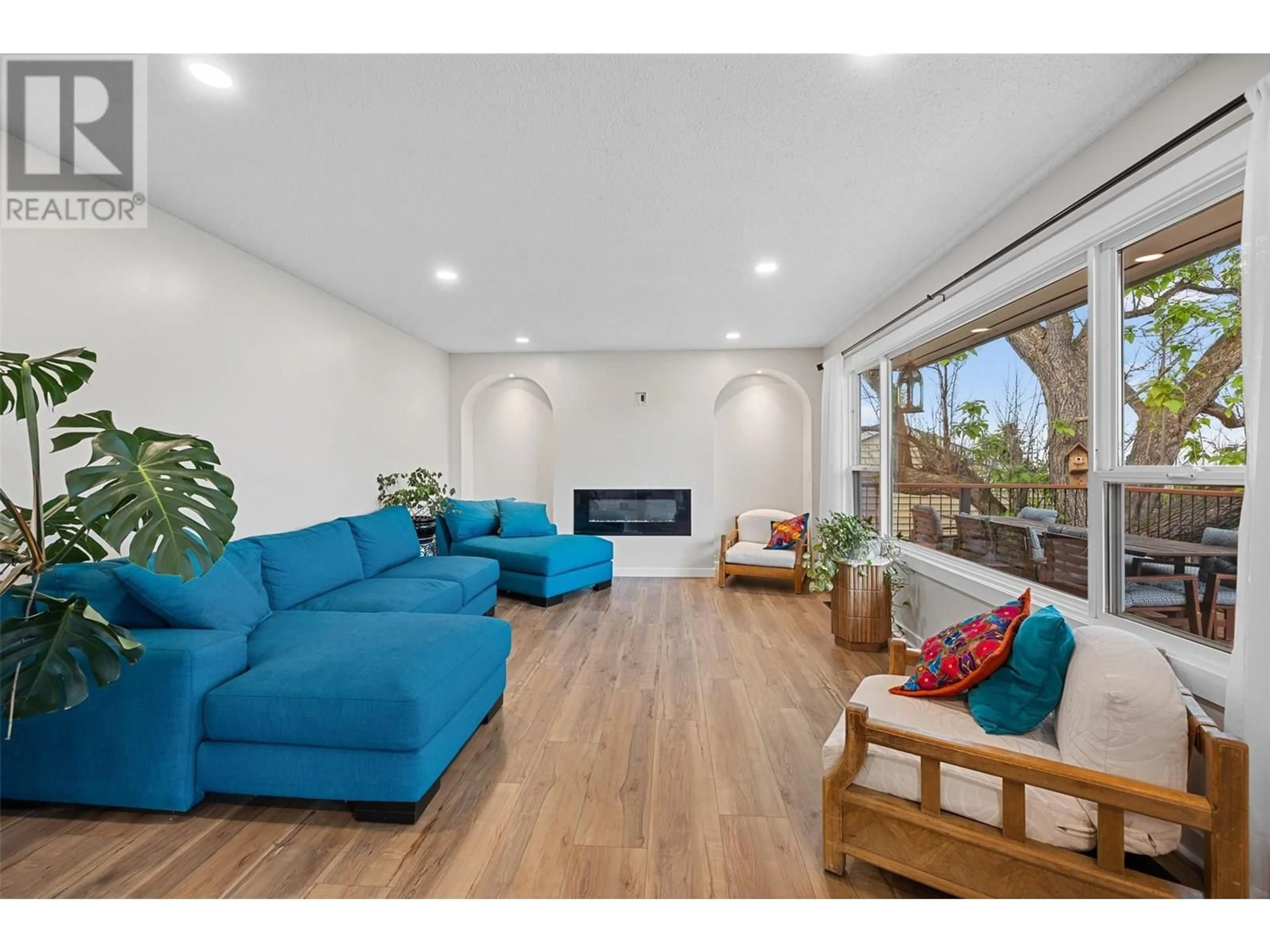 Living room with furniture, wood/laminate floor for 3754 CARRALL ROAD, West Kelowna British Columbia V4t2C6