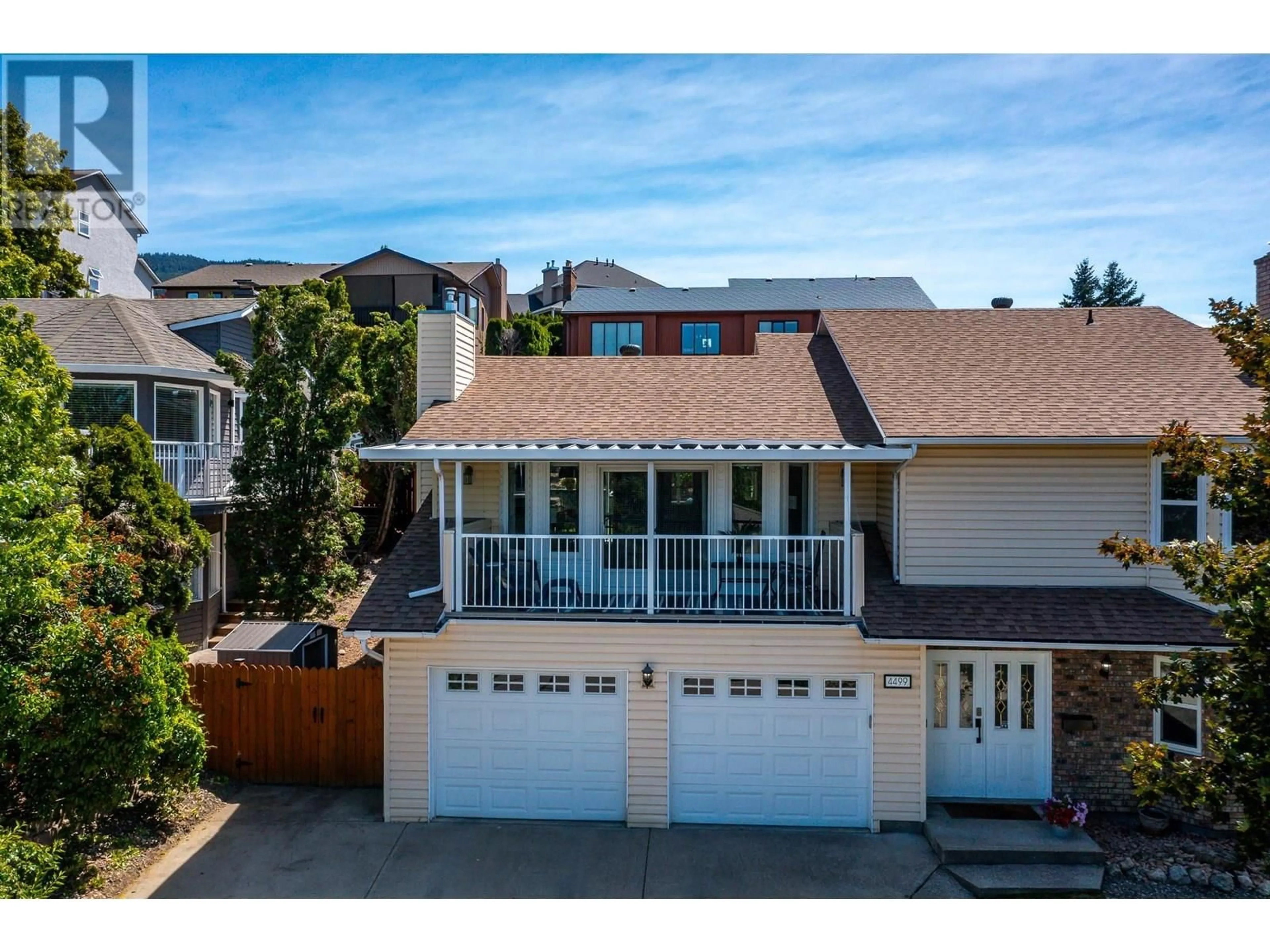 A pic from outside/outdoor area/front of a property/back of a property/a pic from drone, street for 4499 CASCADE DRIVE, Vernon British Columbia V1T8J7