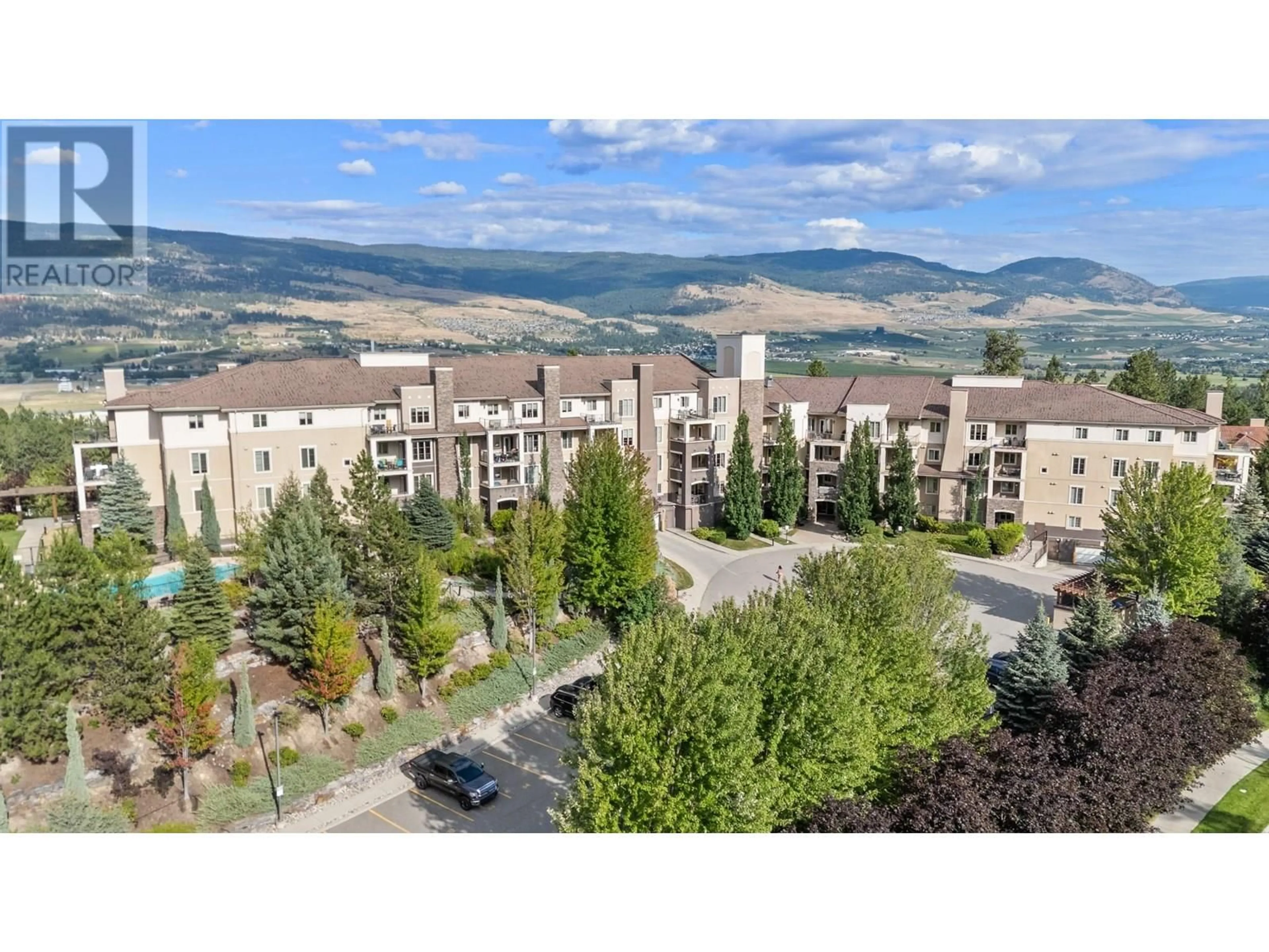 A pic from outside/outdoor area/front of a property/back of a property/a pic from drone, mountain view for 2219 - 1873 COUNTRY CLUB DRIVE, Kelowna British Columbia V1V2W6