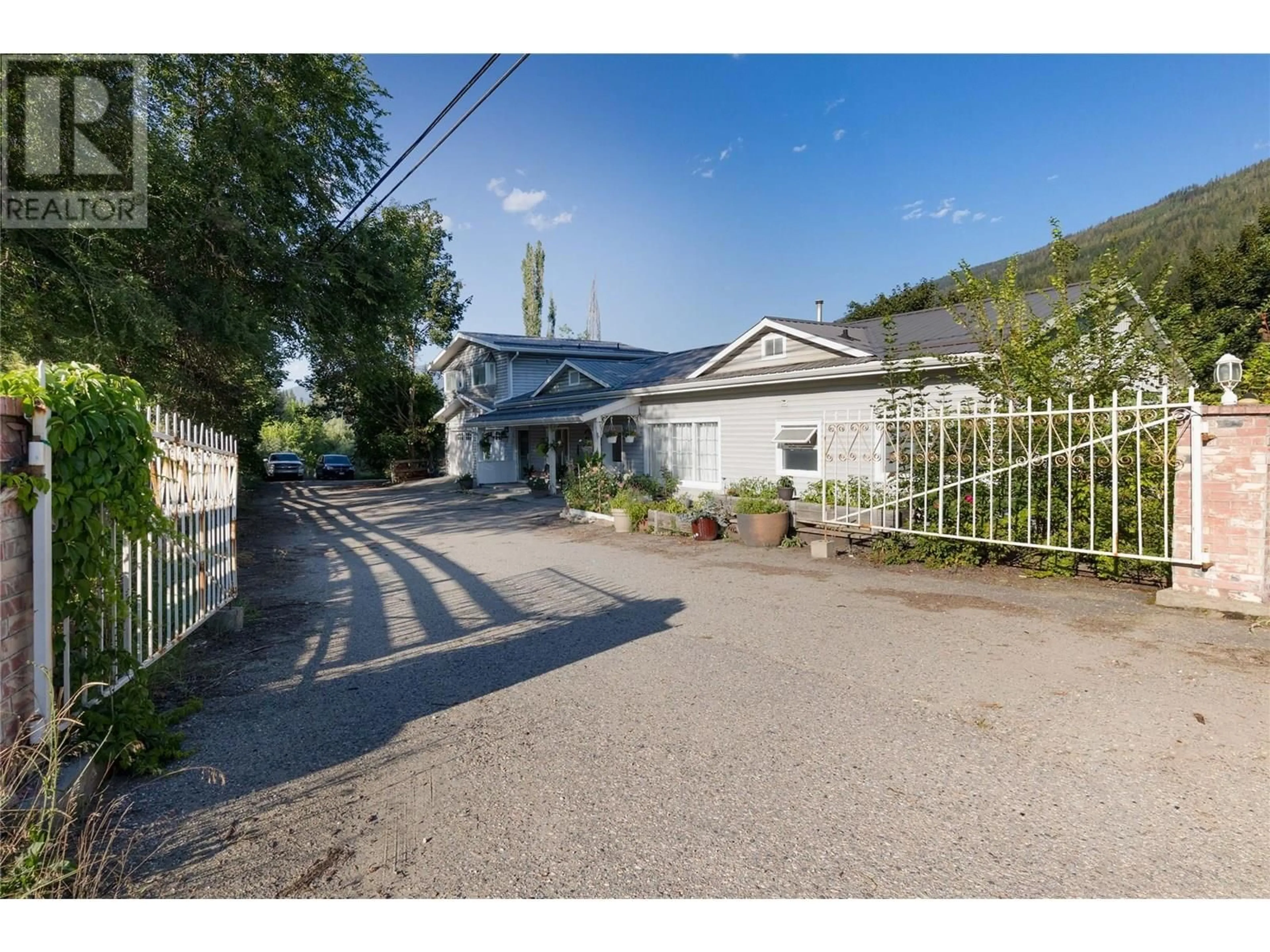 A pic from outside/outdoor area/front of a property/back of a property/a pic from drone, street for 4350 50 STREET NORTHEAST, Salmon Arm British Columbia V1E1Y5