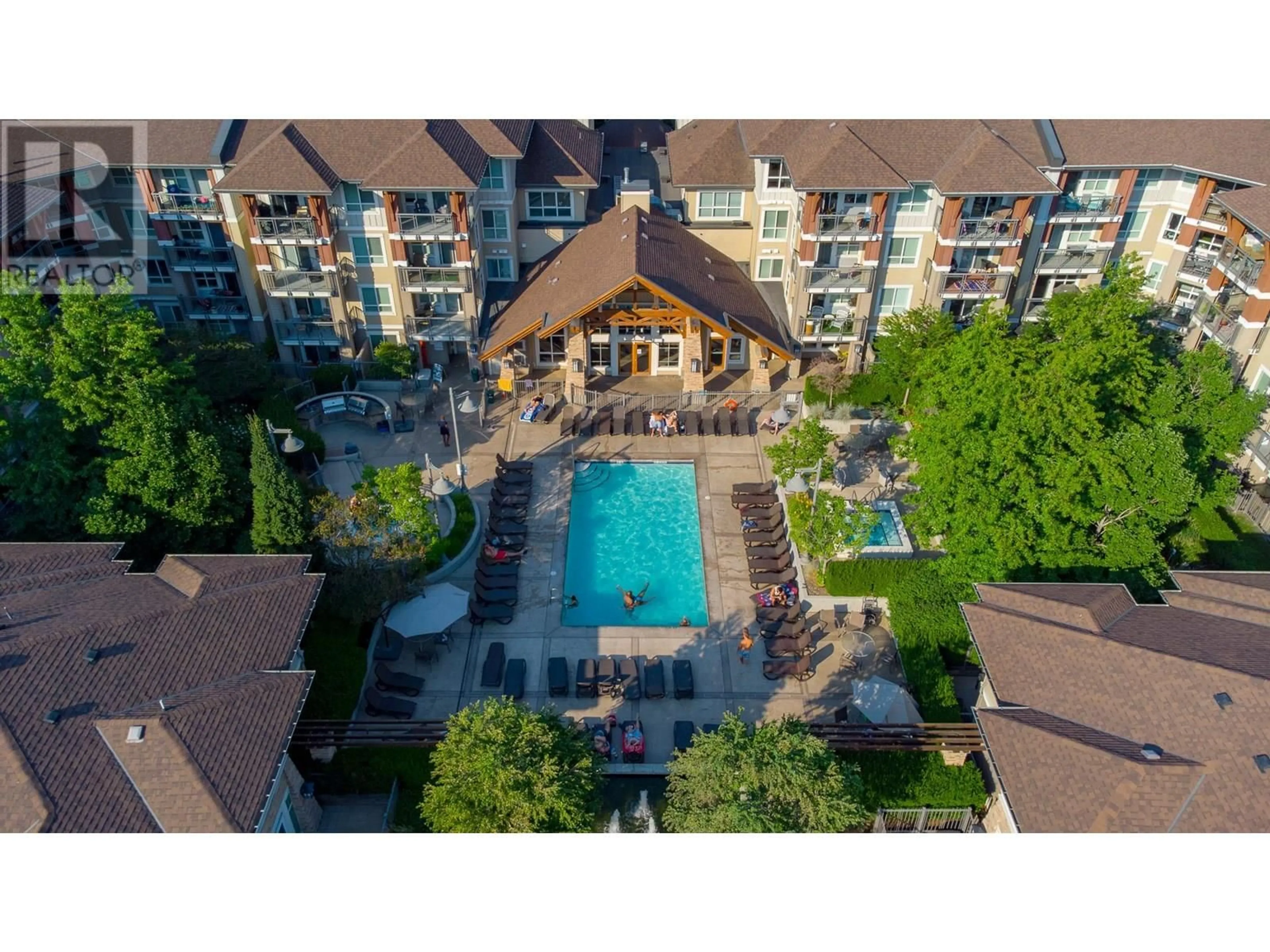 A pic from outside/outdoor area/front of a property/back of a property/a pic from drone, unknown for 120 - 1083 SUNSET DRIVE, Kelowna British Columbia V1Y9Z1