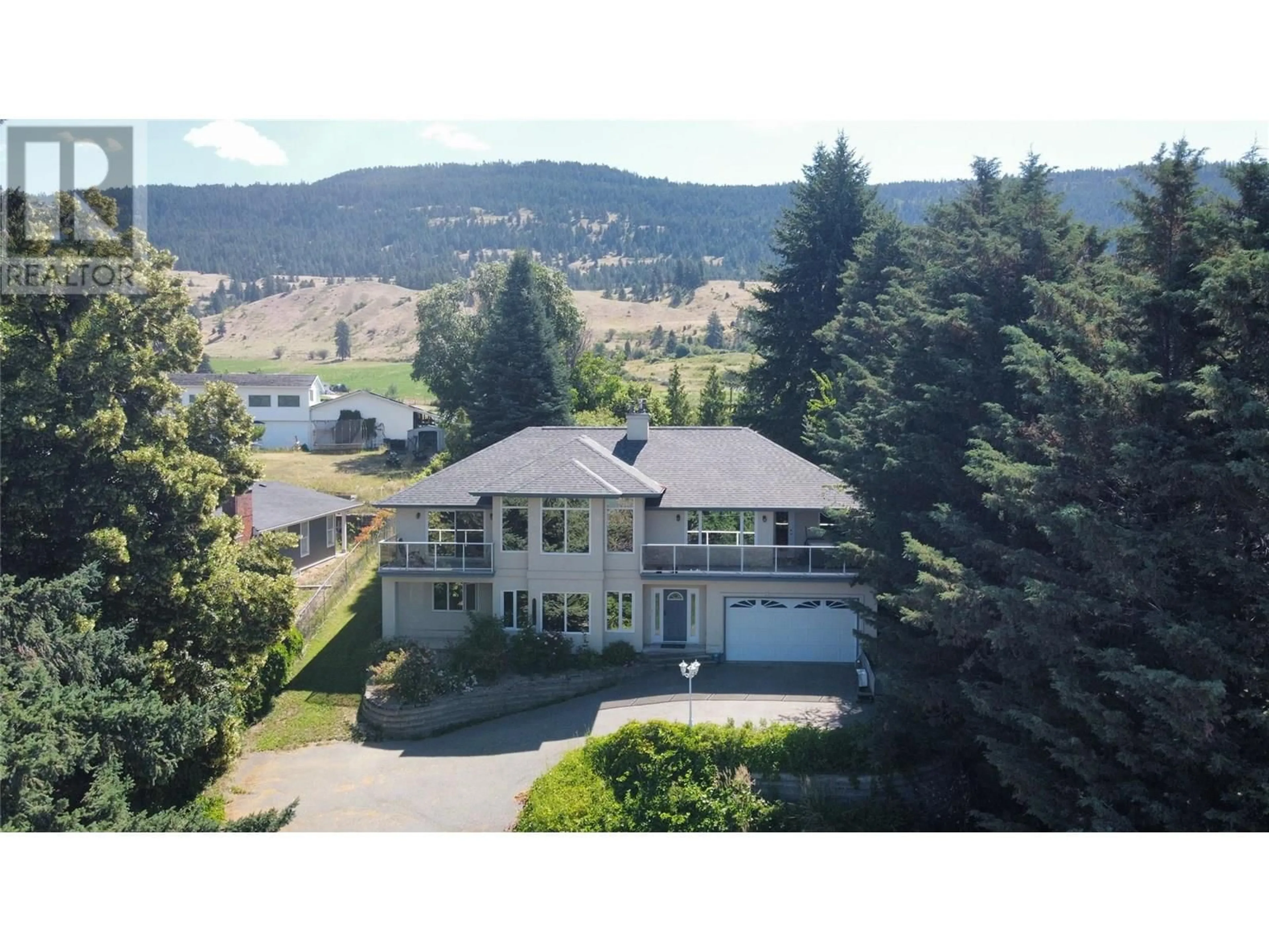 A pic from outside/outdoor area/front of a property/back of a property/a pic from drone, mountain view for 12857 OYAMA ROAD, Lake Country British Columbia V4V2A7