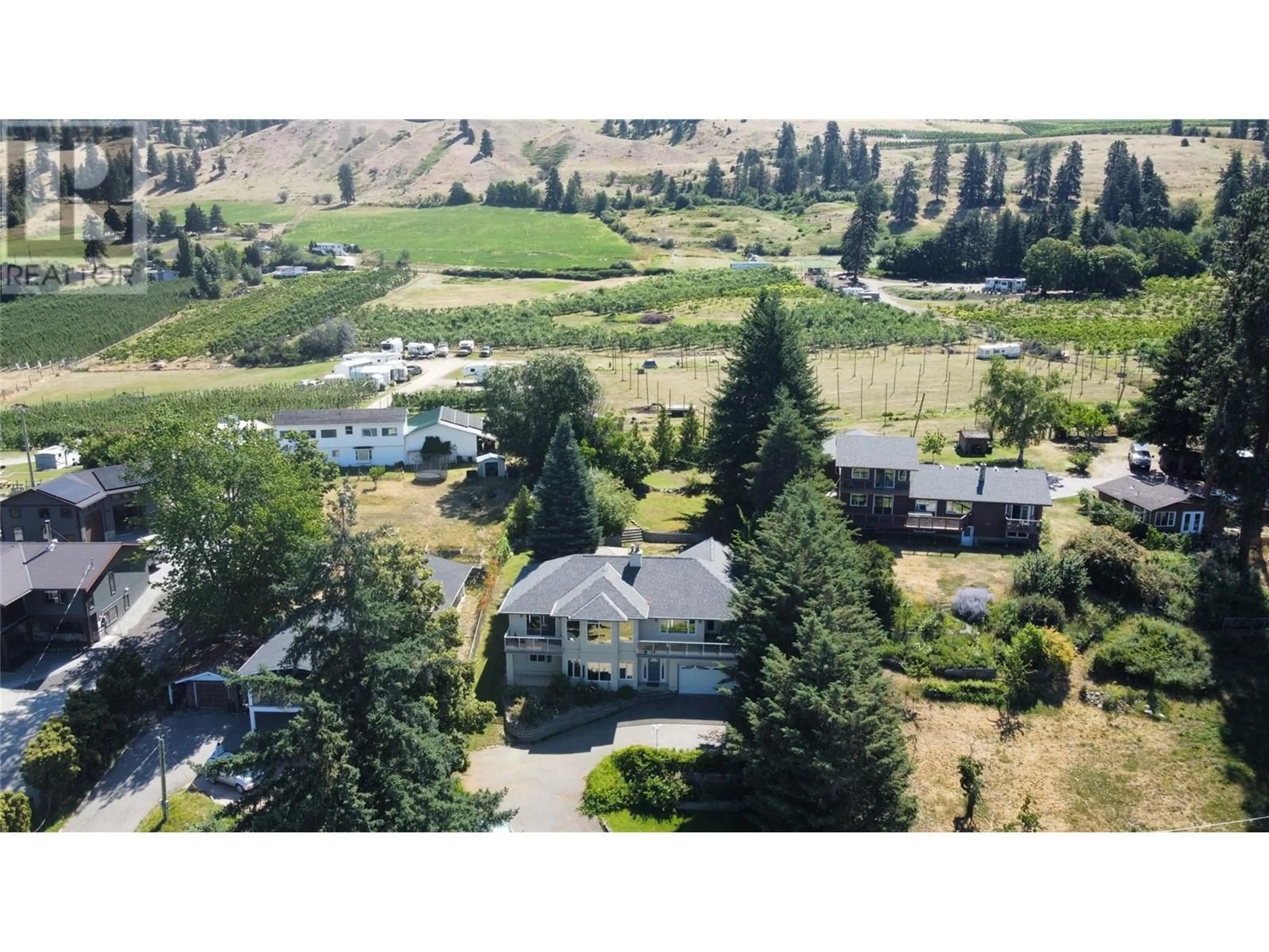 A pic from outside/outdoor area/front of a property/back of a property/a pic from drone, mountain view for 12857 OYAMA ROAD, Lake Country British Columbia V4V2A7