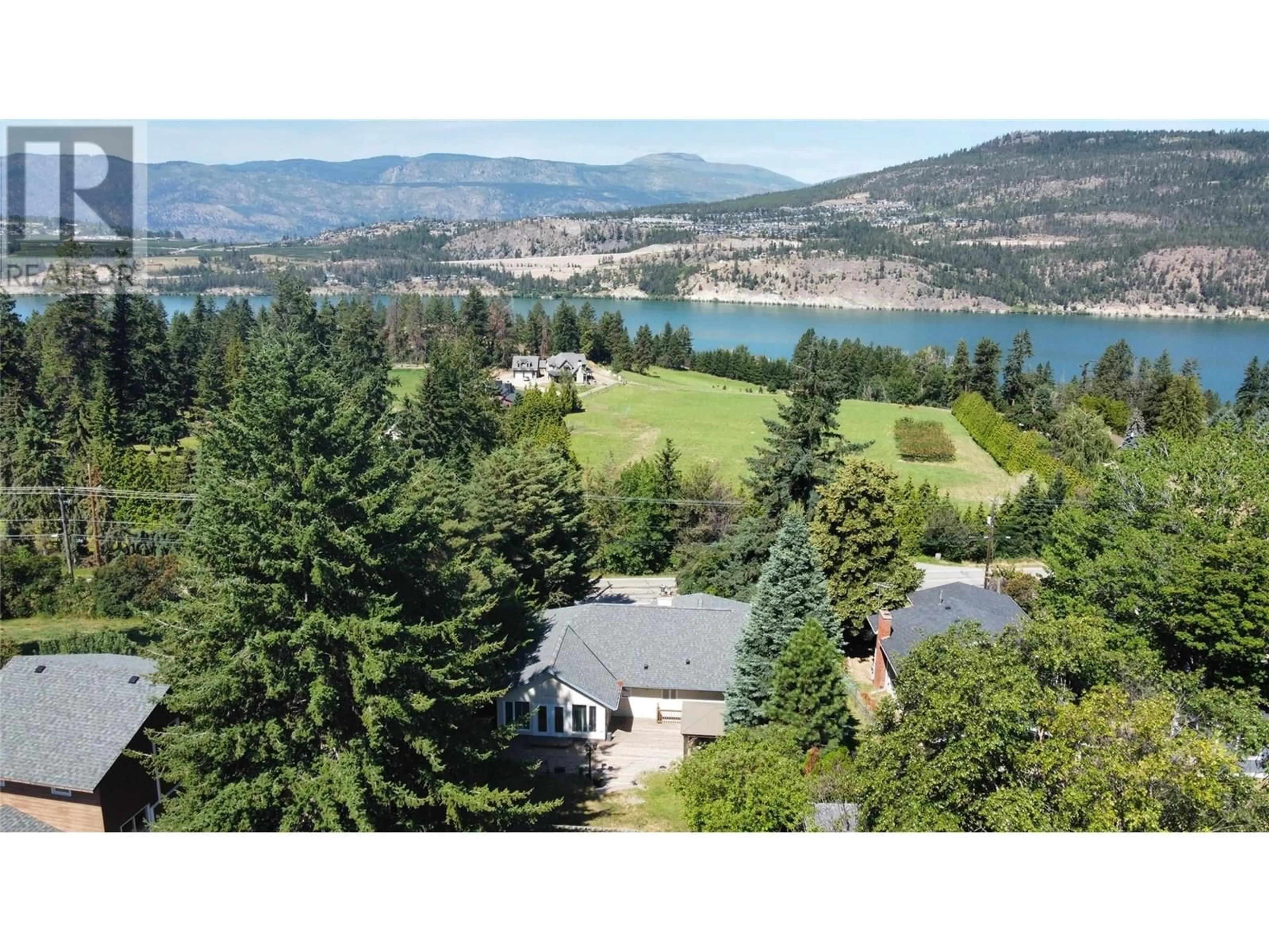 A pic from outside/outdoor area/front of a property/back of a property/a pic from drone, water/lake/river/ocean view for 12857 OYAMA ROAD, Lake Country British Columbia V4V2A7