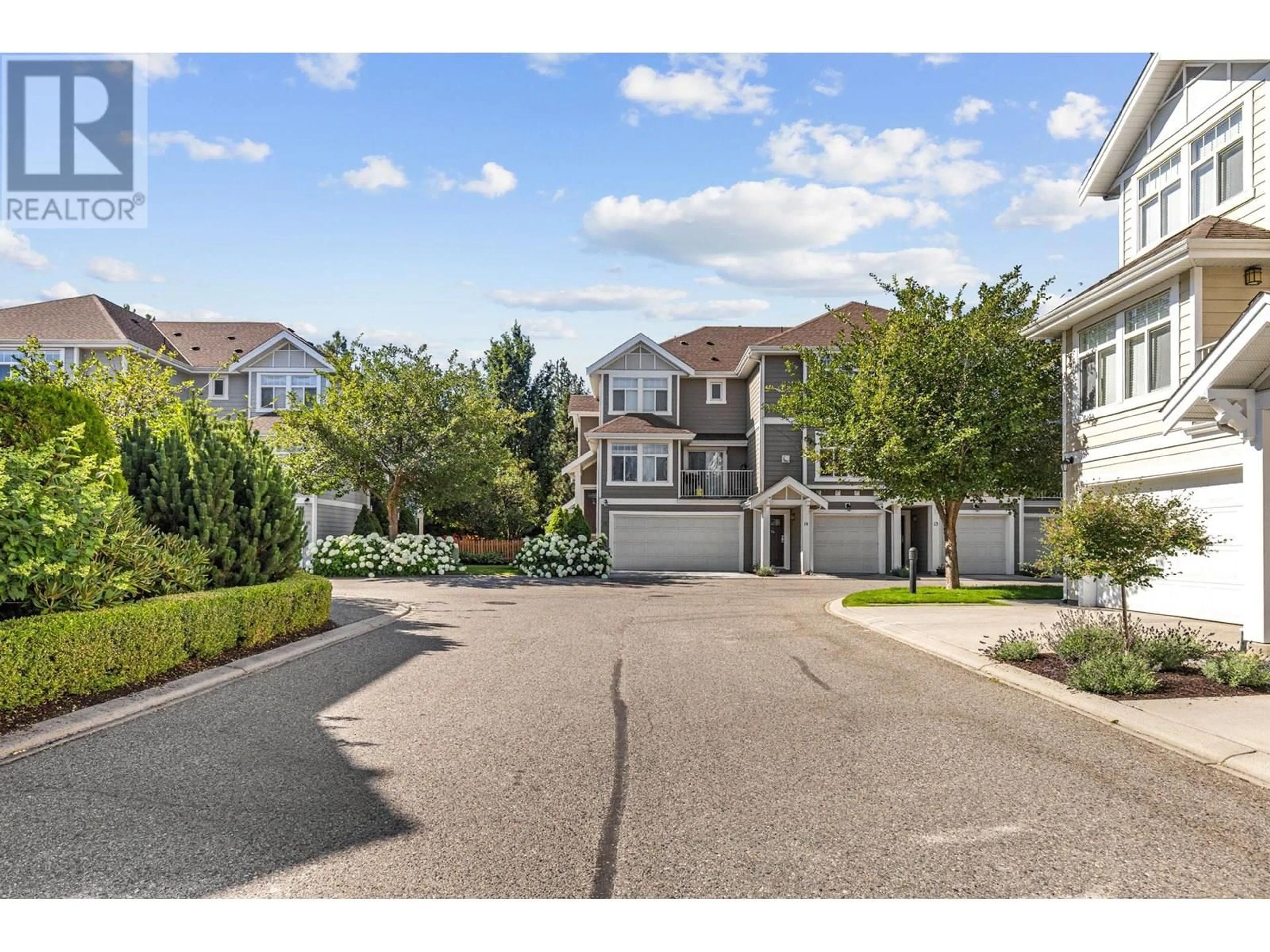 A pic from outside/outdoor area/front of a property/back of a property/a pic from drone, street for 14 - 1853 PARKVIEW CRESCENT, Kelowna British Columbia V1X8A3