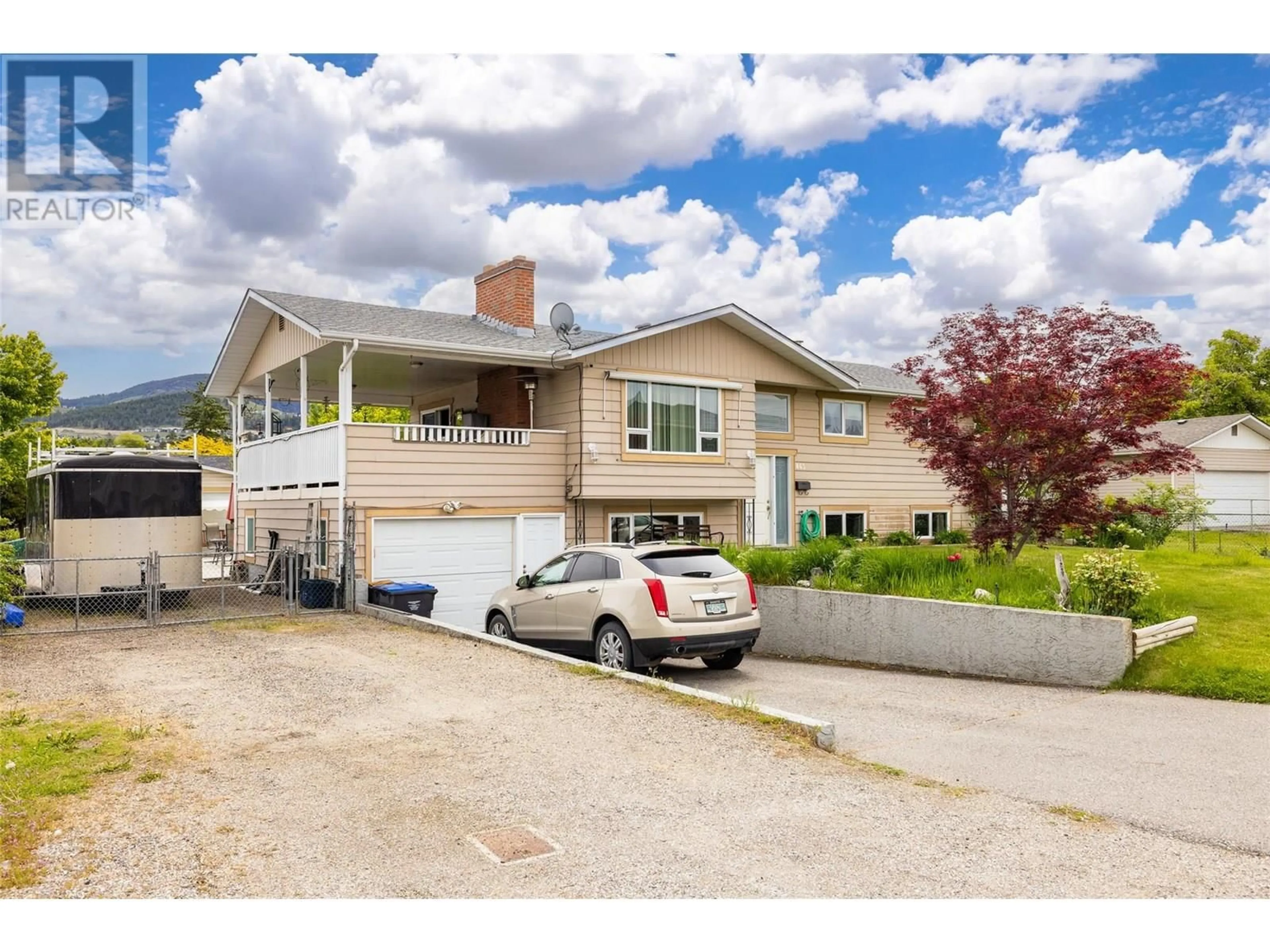 Home with vinyl exterior material, street for 865 KITCH ROAD, Kelowna British Columbia V1X5V8
