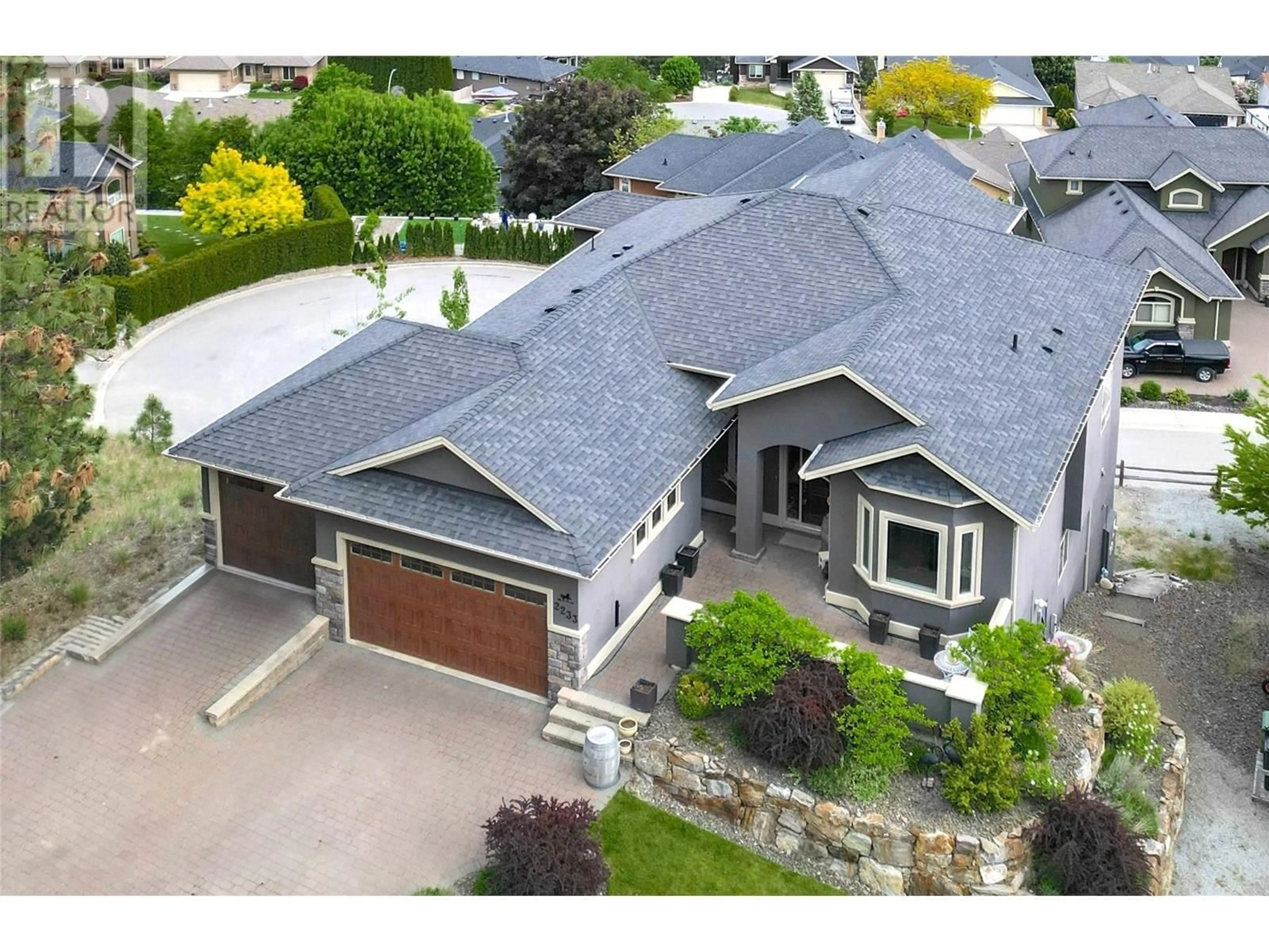 Home with vinyl exterior material, street for 2233 HIHANNAH DRIVE, West Kelowna British Columbia V4T3C9