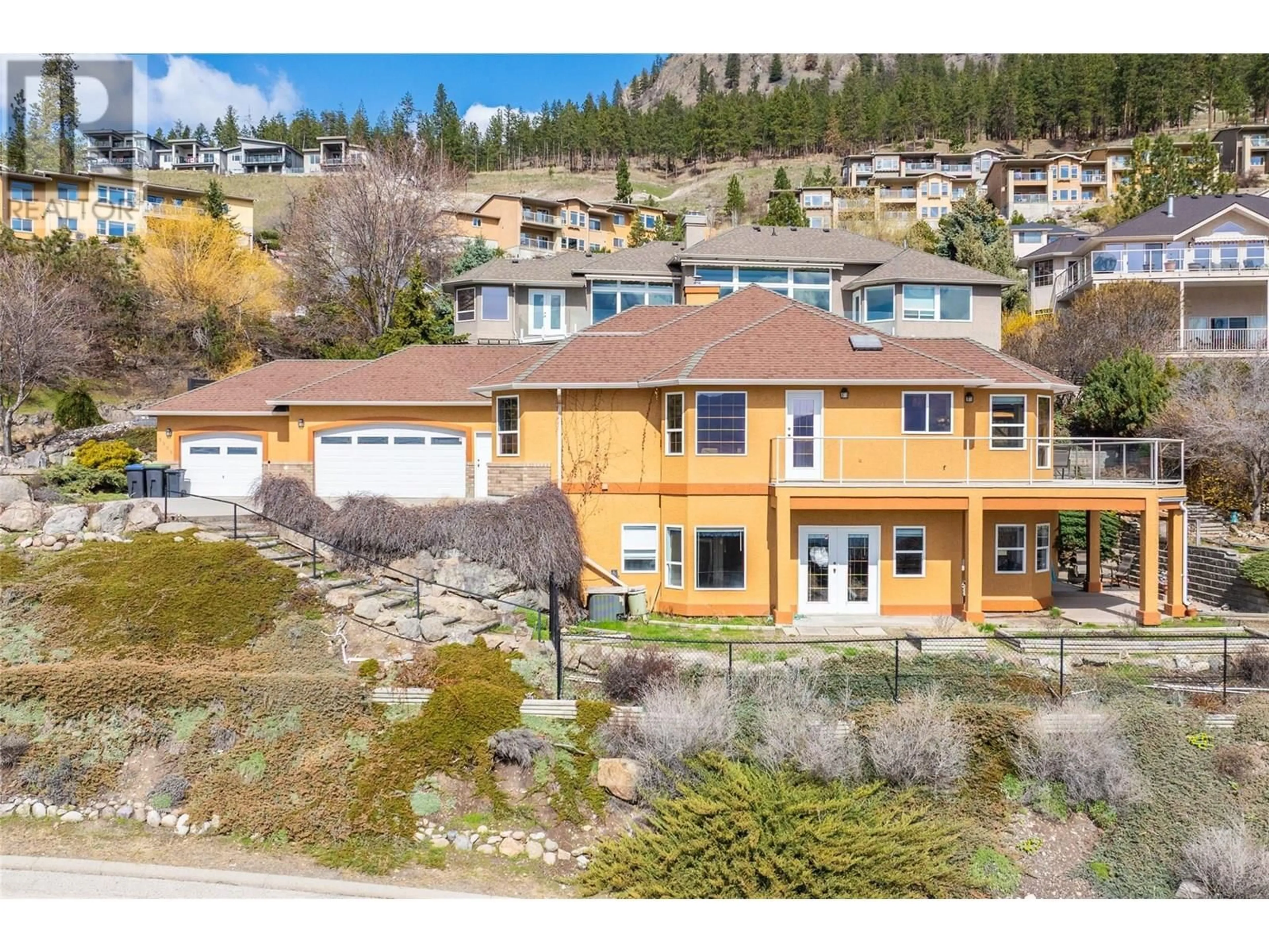 A pic from outside/outdoor area/front of a property/back of a property/a pic from drone, mountain view for 5205 MACNEILL COURT, Peachland British Columbia V0H1X2