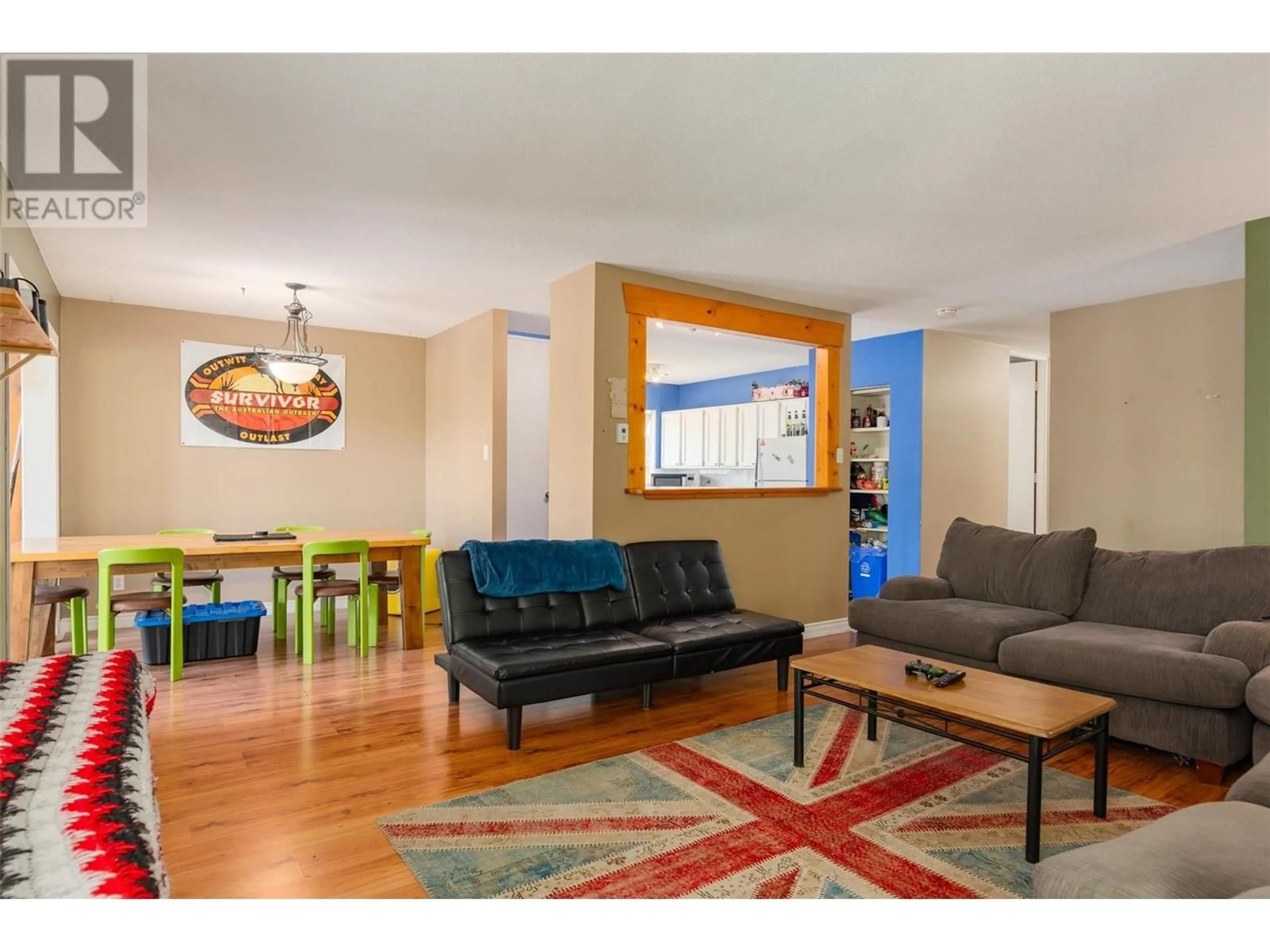 Living room with furniture, wood/laminate floor for 717 INNES STREET, Nelson British Columbia V1L5G5