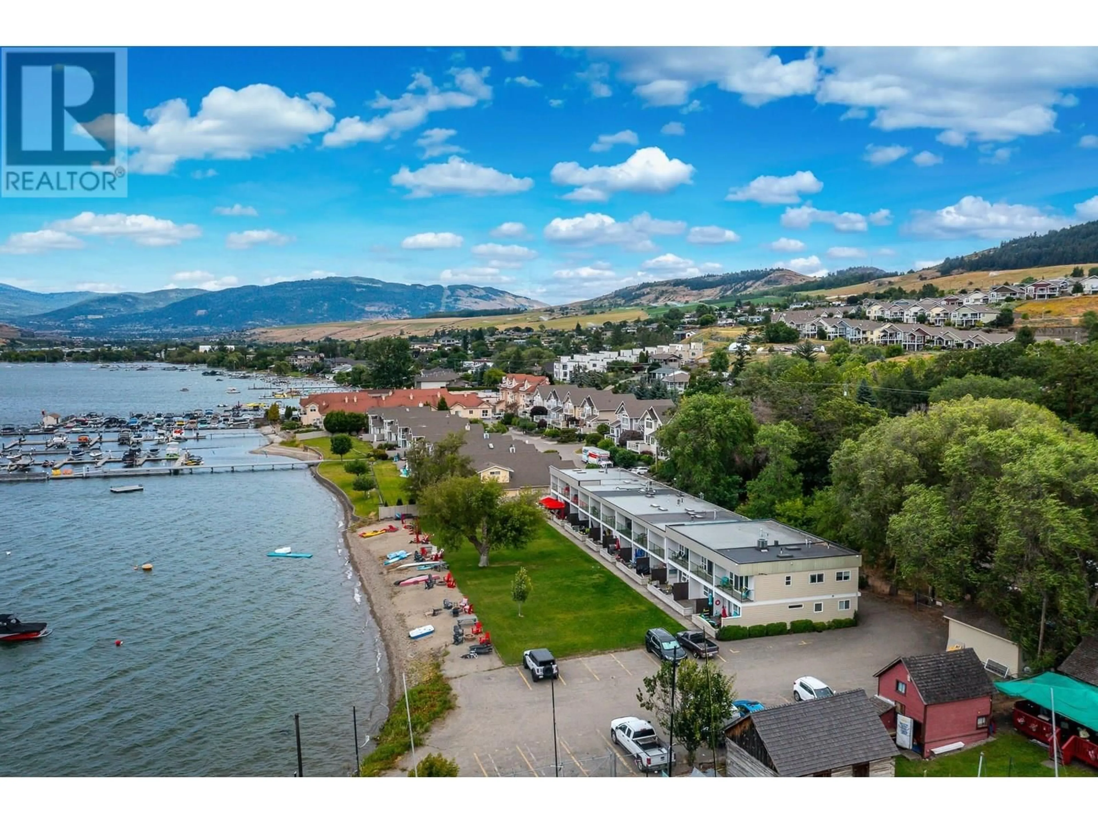 A pic from outside/outdoor area/front of a property/back of a property/a pic from drone, water/lake/river/ocean view for 6 - 7779 OKANAGAN LANDING ROAD, Vernon British Columbia V1H1L4