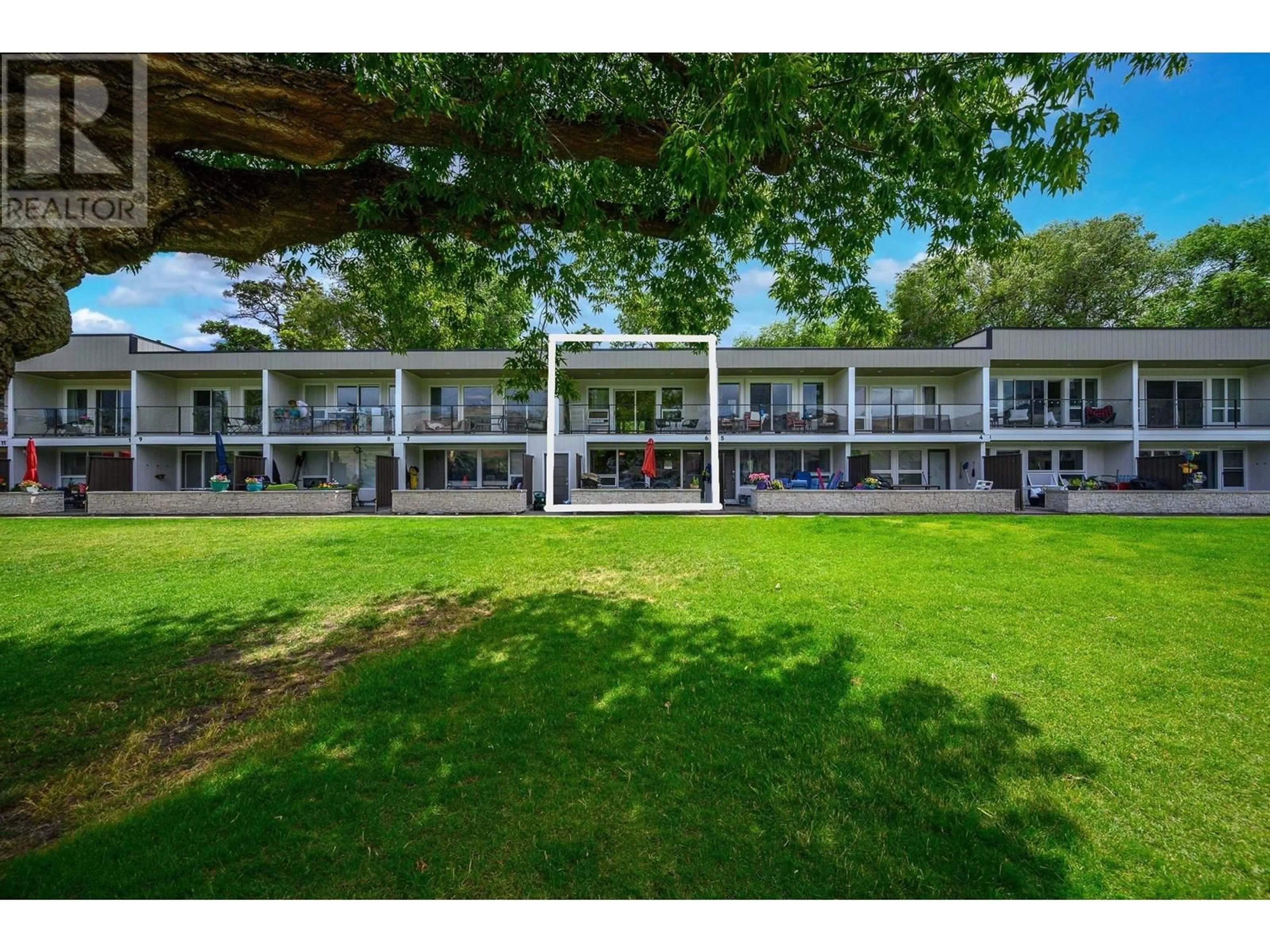 A pic from outside/outdoor area/front of a property/back of a property/a pic from drone, unknown for 6 - 7779 OKANAGAN LANDING ROAD, Vernon British Columbia V1H1L4