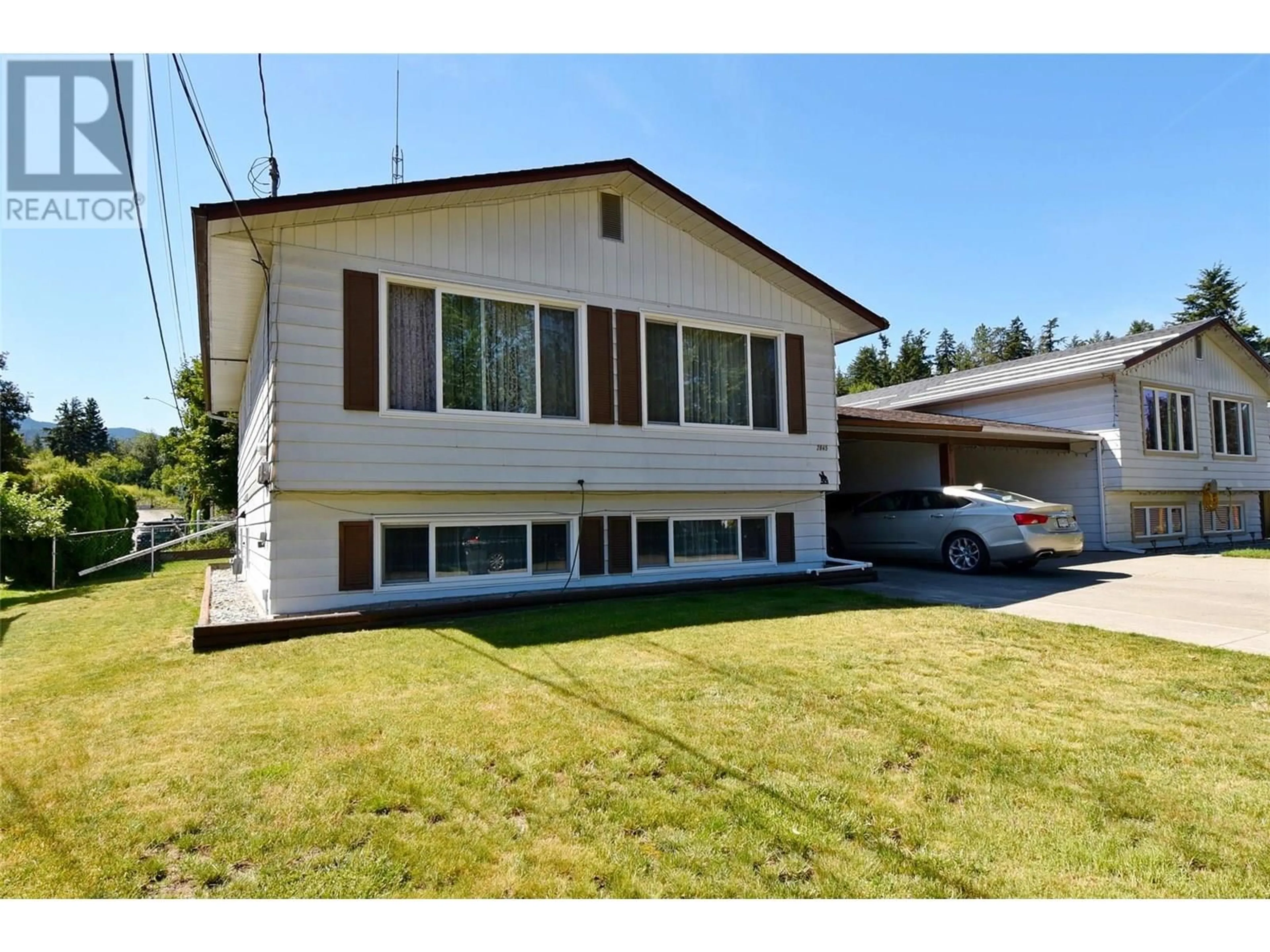 Home with vinyl exterior material, street for 2845 BURNS AVENUE, Armstrong British Columbia V0E1B2