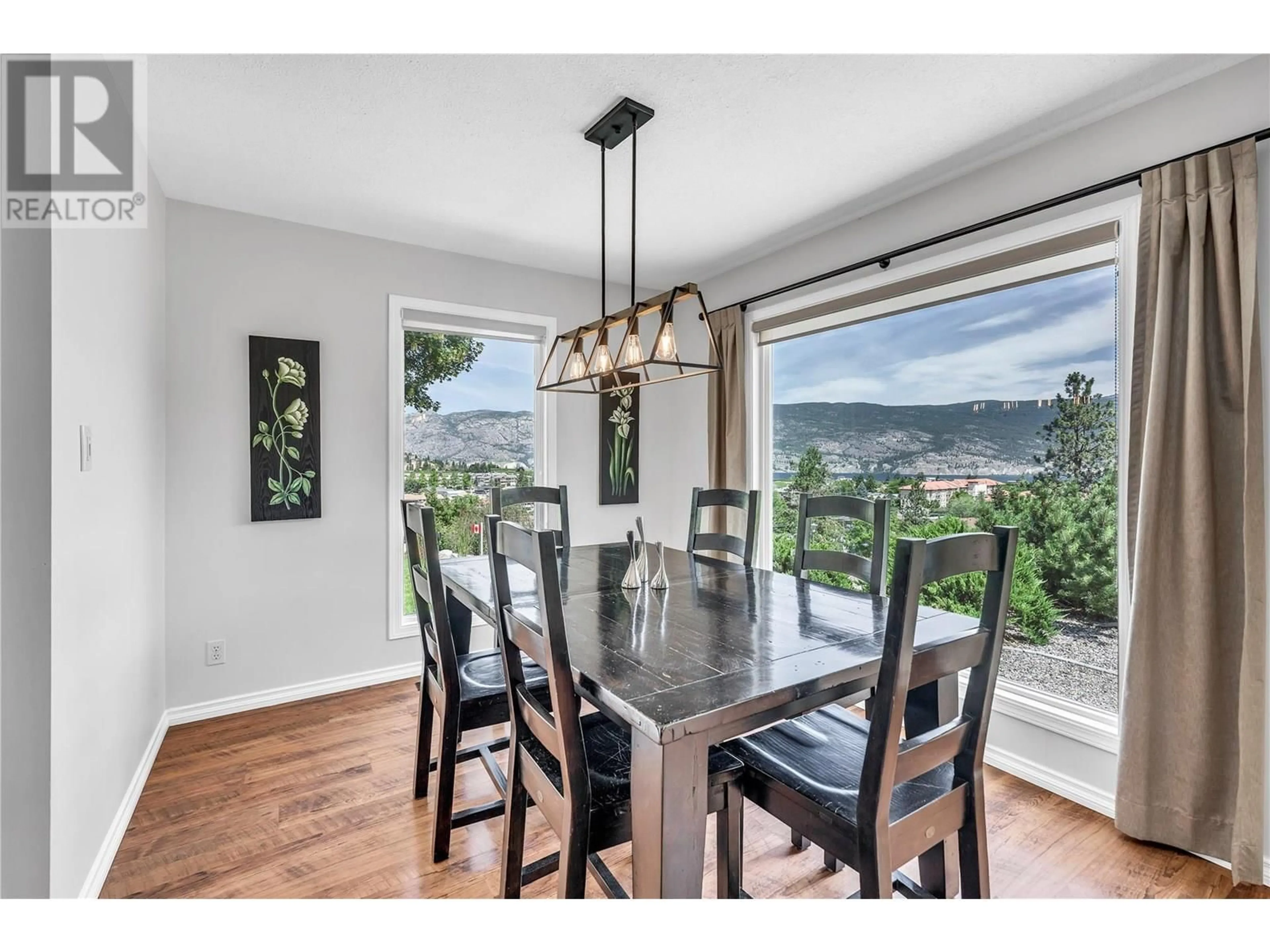 Dining room, wood/laminate floor for 8704 KURODA PLACE, Summerland British Columbia V0H1Z7