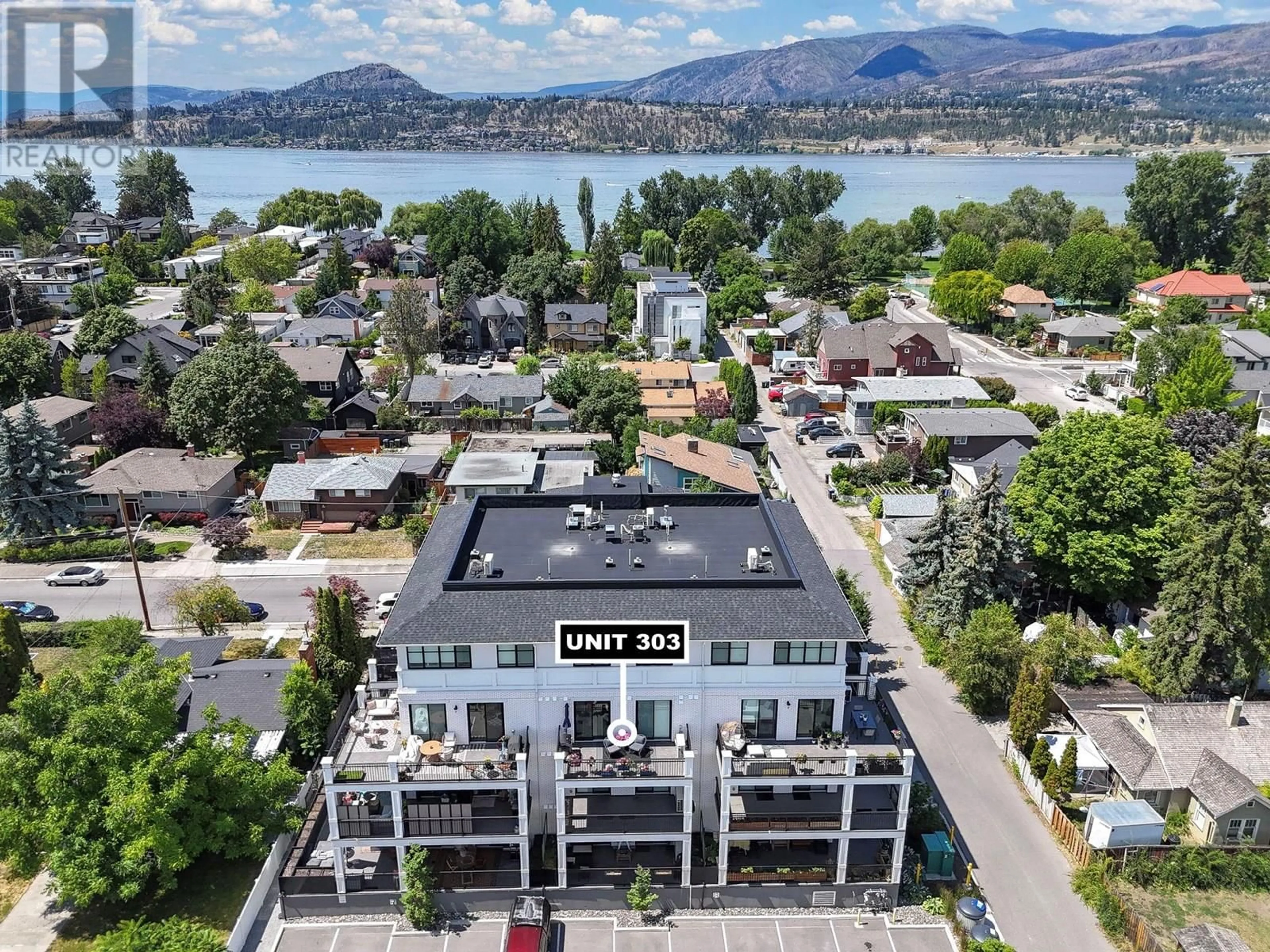 A pic from outside/outdoor area/front of a property/back of a property/a pic from drone, water/lake/river/ocean view for 303 - 2627 GORE STREET, Kelowna British Columbia V1W1M6