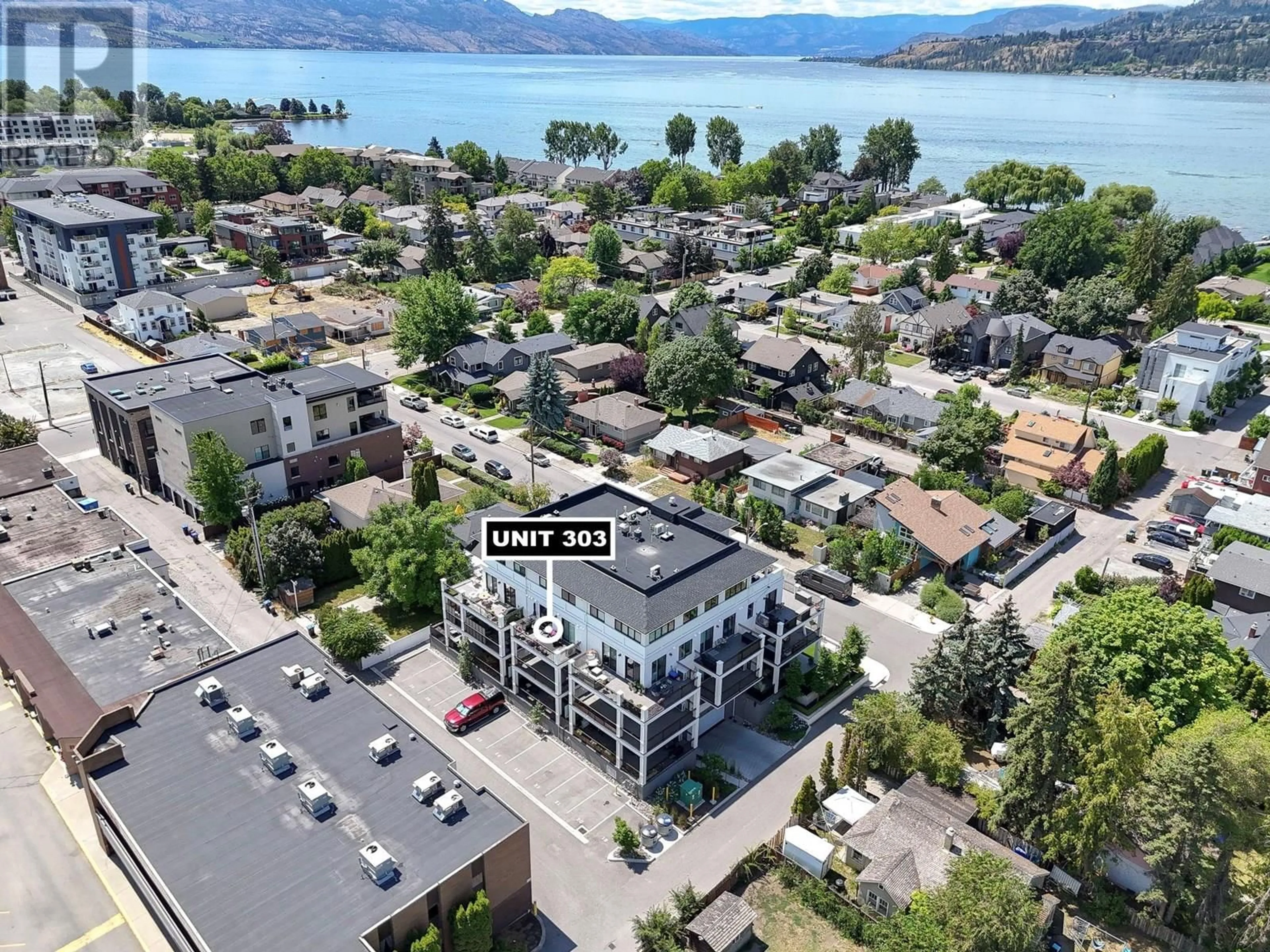 A pic from outside/outdoor area/front of a property/back of a property/a pic from drone, water/lake/river/ocean view for 303 - 2627 GORE STREET, Kelowna British Columbia V1W1M6