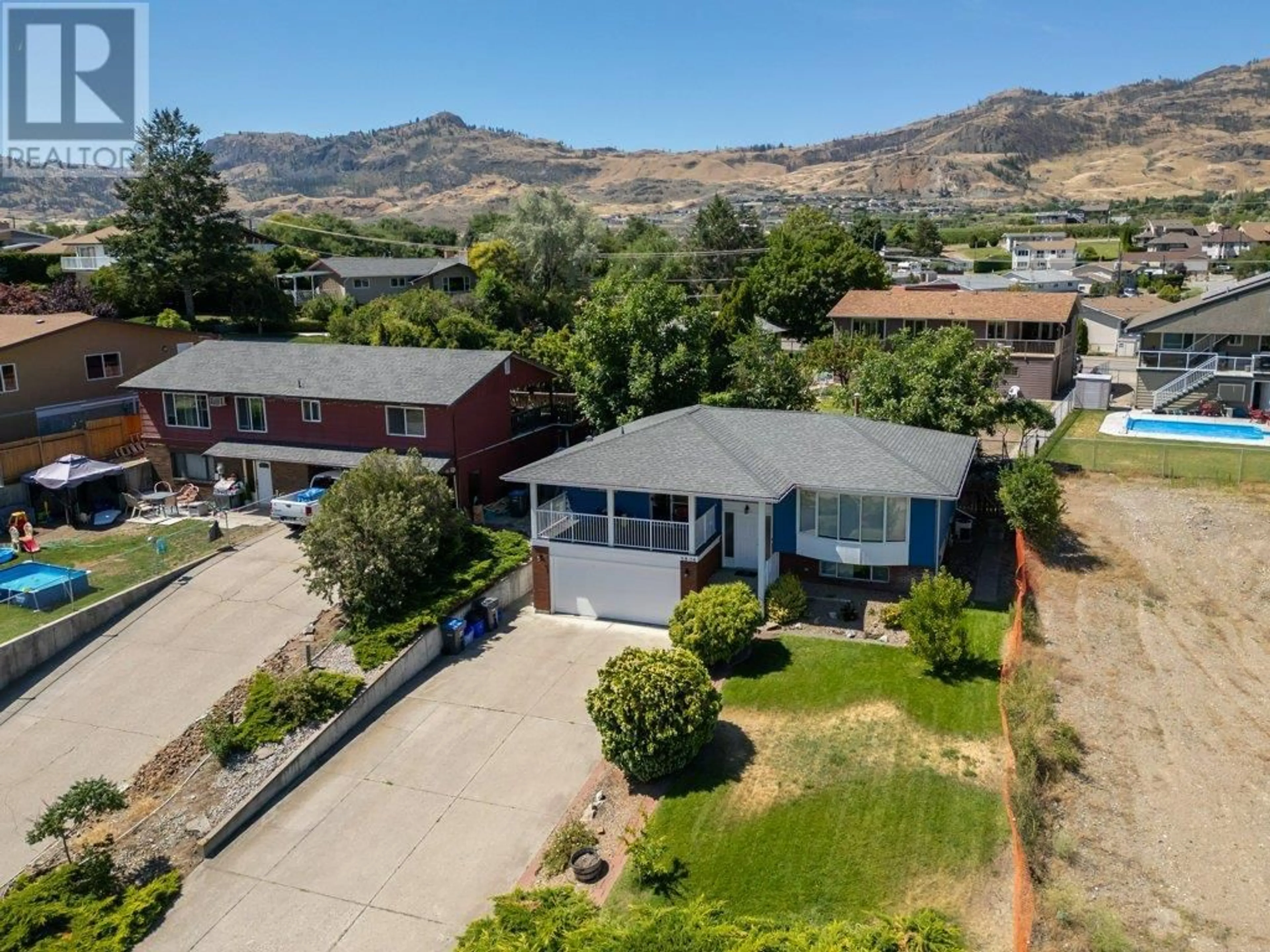 A pic from outside/outdoor area/front of a property/back of a property/a pic from drone, mountain view for 5806 OLEANDER DRIVE, Osoyoos British Columbia V0H1V1