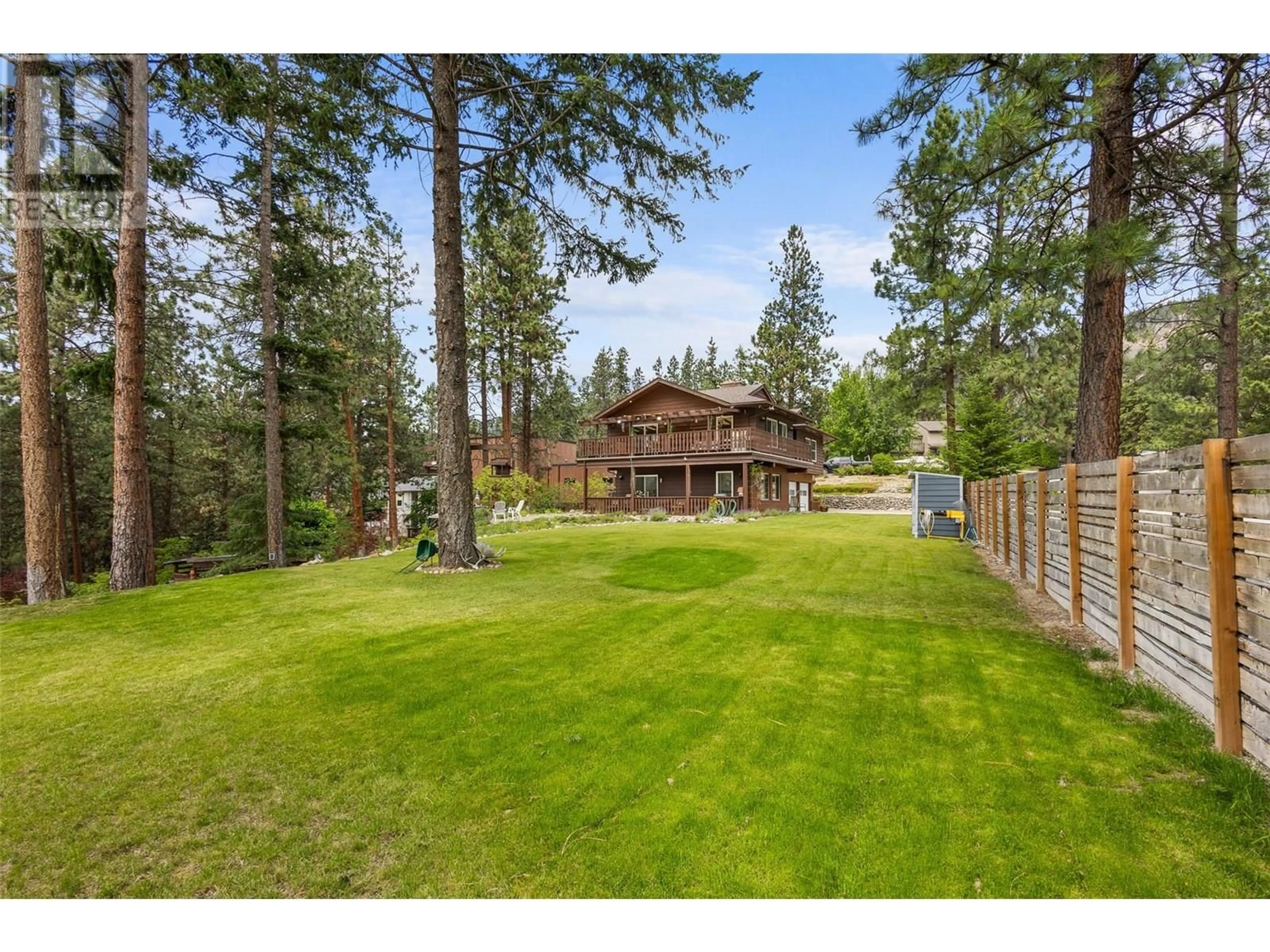 A pic from outside/outdoor area/front of a property/back of a property/a pic from drone, forest/trees view for 3947 TREPANIER HEIGHTS PLACE, Peachland British Columbia V0H1X2