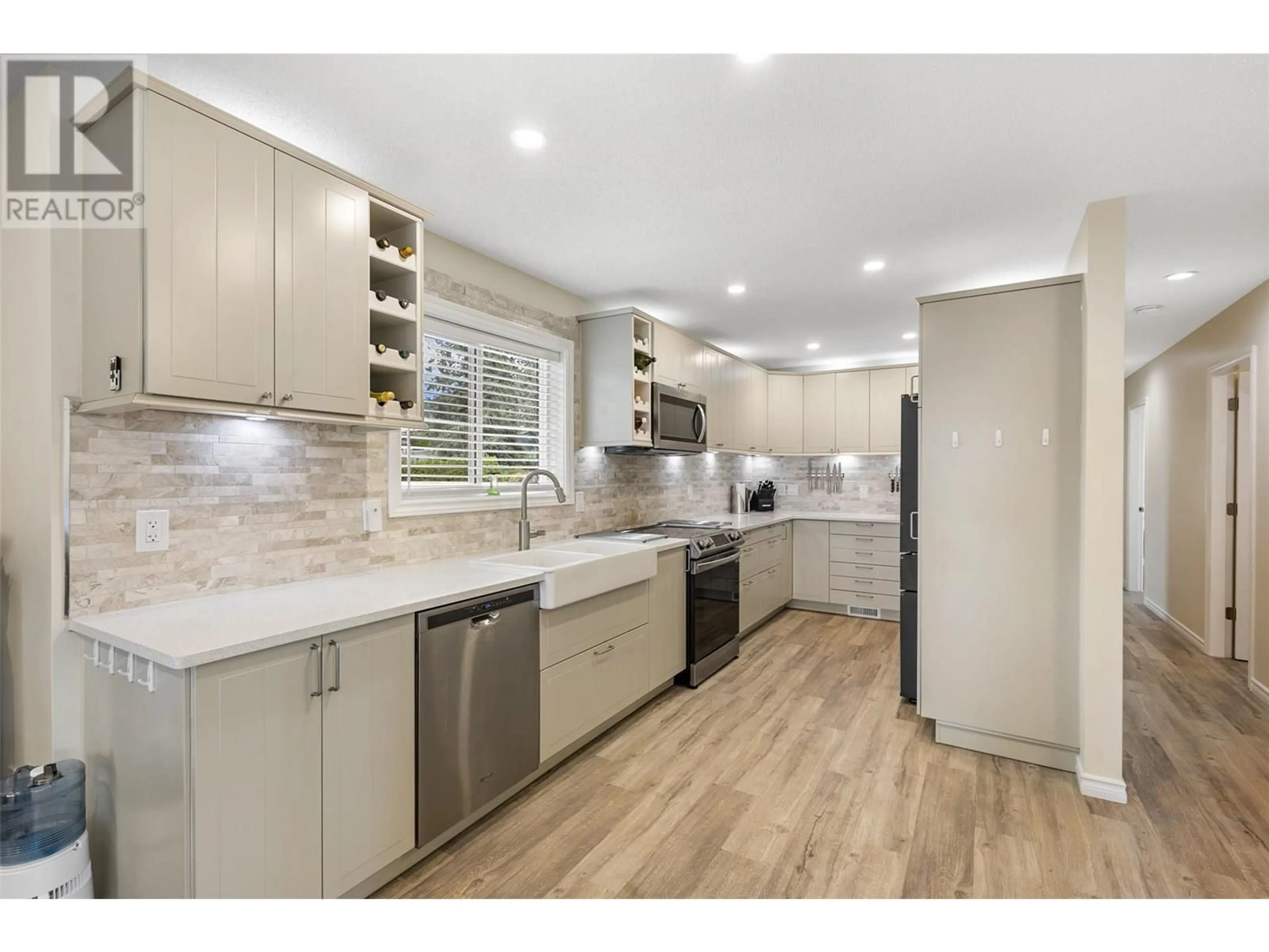 Open concept kitchen, ceramic/tile floor for 3947 TREPANIER HEIGHTS PLACE, Peachland British Columbia V0H1X2