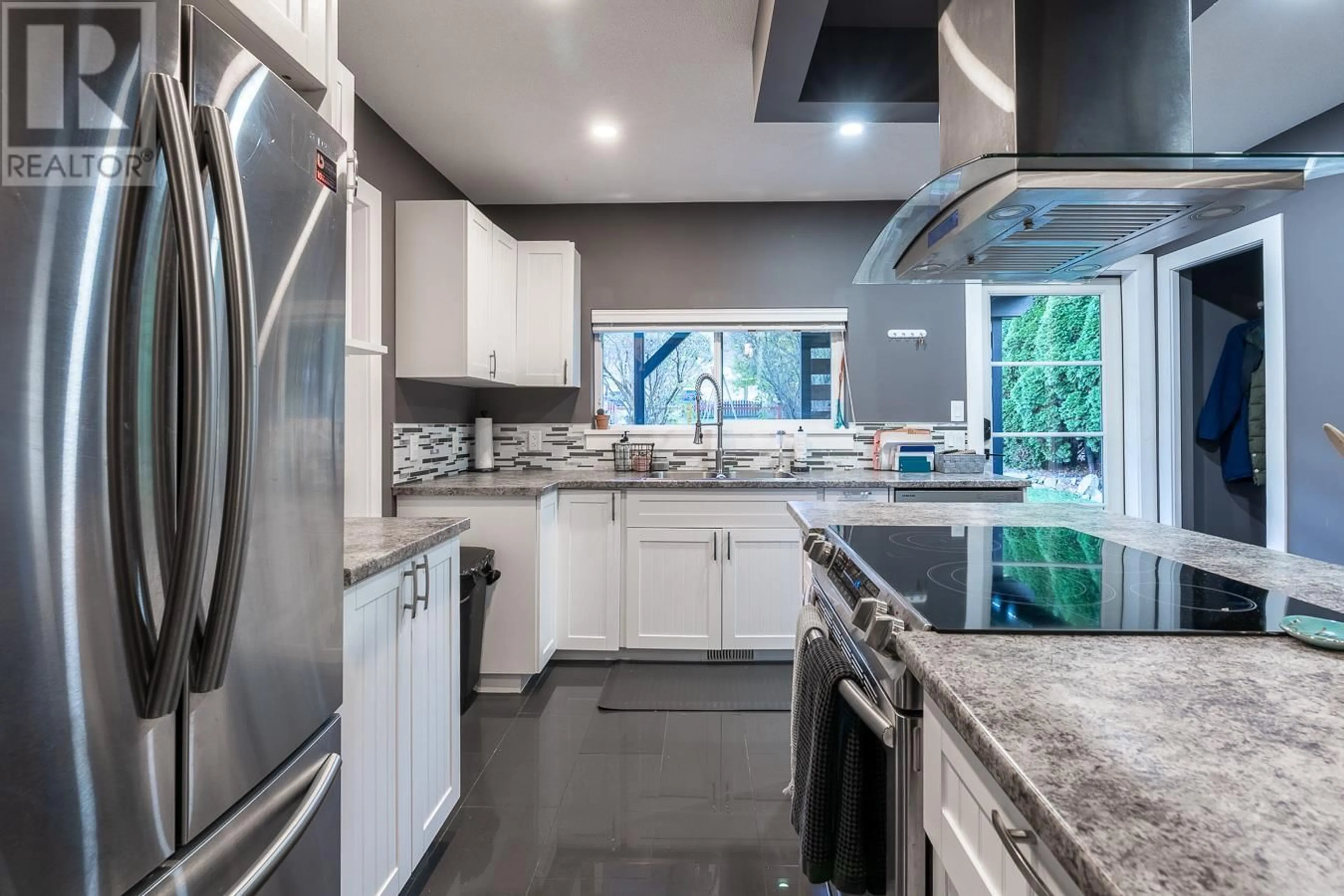 Contemporary kitchen, ceramic/tile floor for 4349 YELLOWHEAD HIGHWAY, Kamloops British Columbia V2H1N4