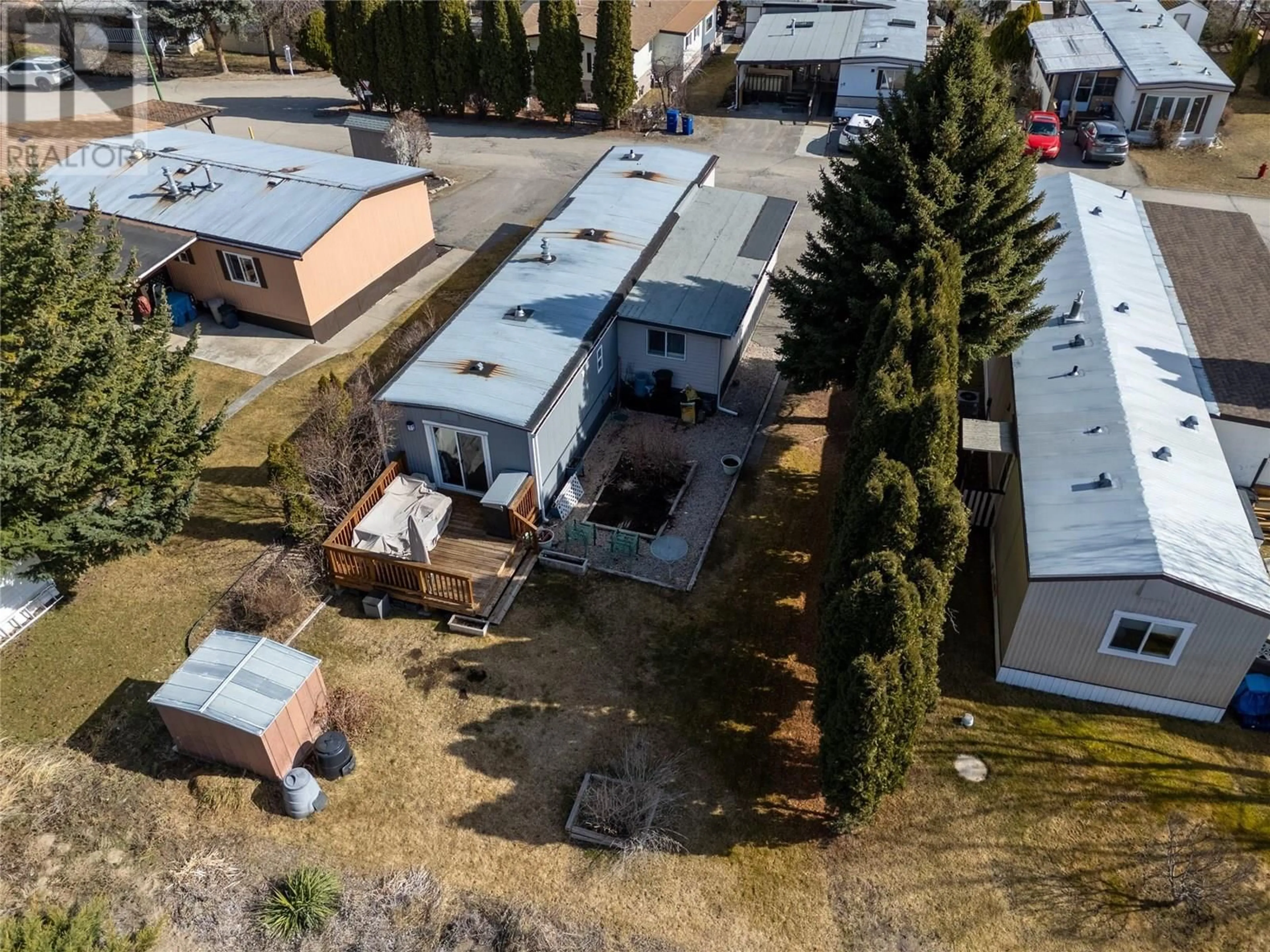 A pic from outside/outdoor area/front of a property/back of a property/a pic from drone, building for 64 - 1929 97 HIGHWAY SOUTH, West Kelowna British Columbia V1Z2Z1