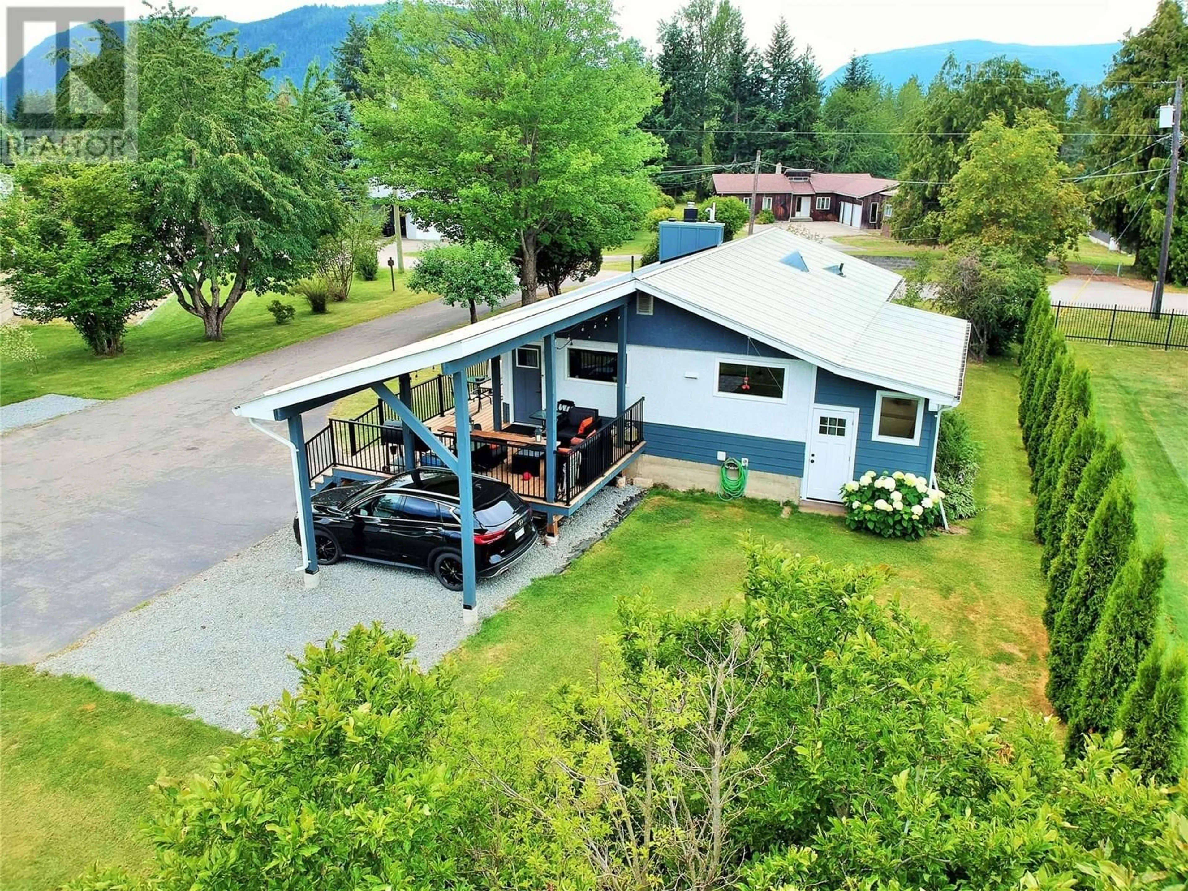 A pic from outside/outdoor area/front of a property/back of a property/a pic from drone, mountain view for 1421 RAUMA AVENUE, Sicamous British Columbia V0E2V4