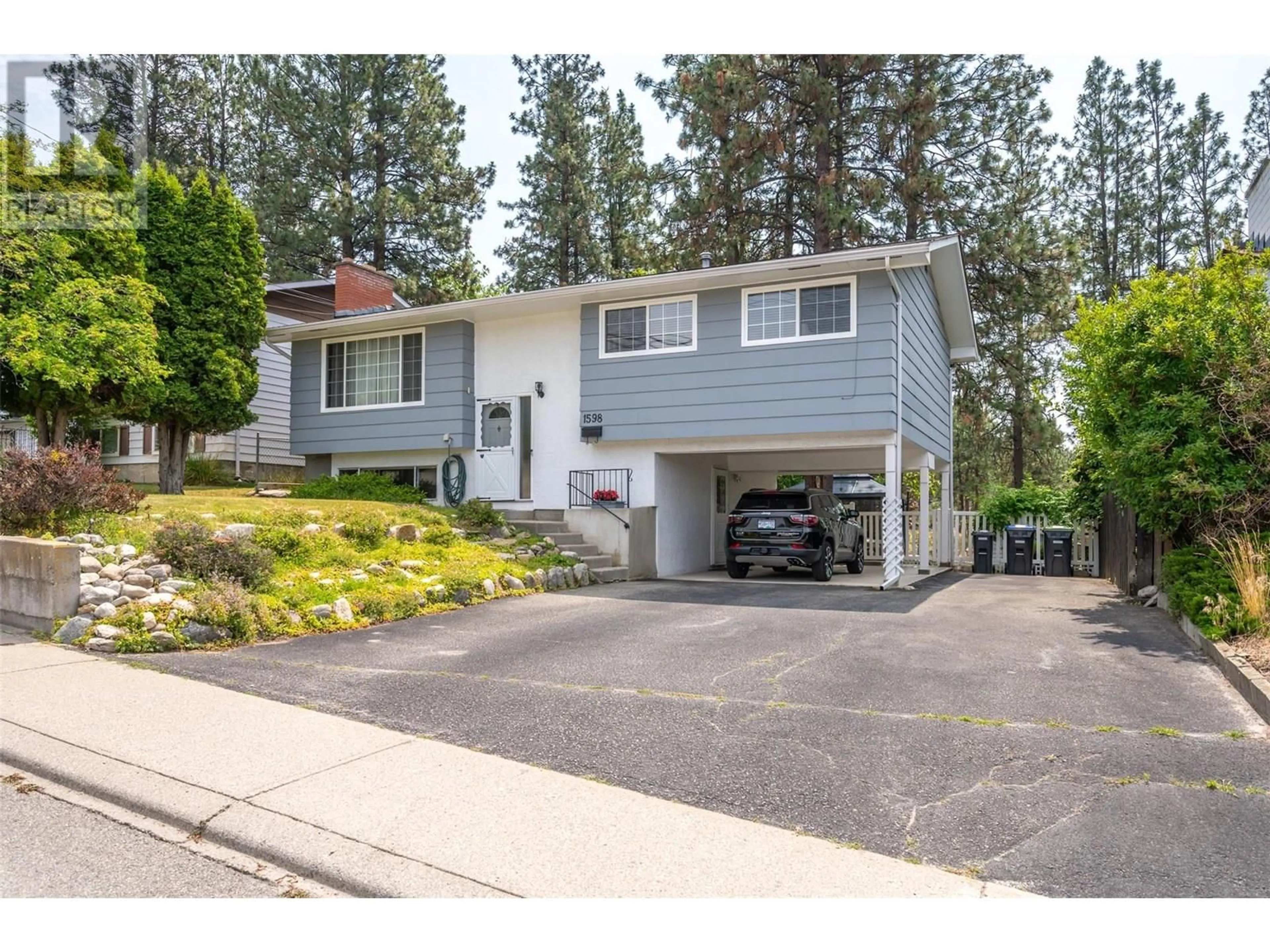 Home with vinyl exterior material, street for 1598 CARMI AVENUE, Penticton British Columbia V2A6M8